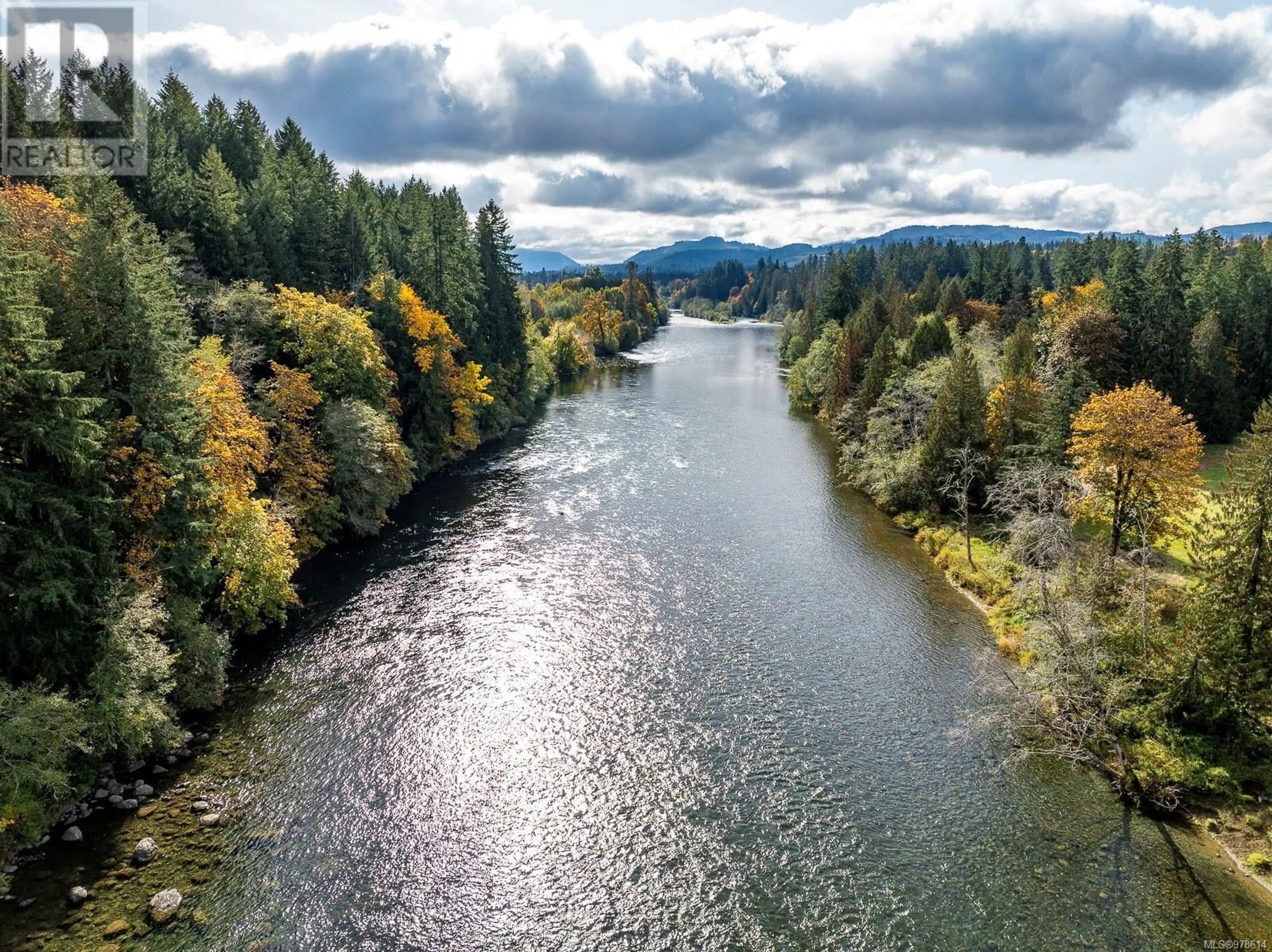 A pic from outside/outdoor area/front of a property/back of a property/a pic from drone, water/lake/river/ocean view for 6979 HILLS ROAD, Port Alberni British Columbia V9Y8L4