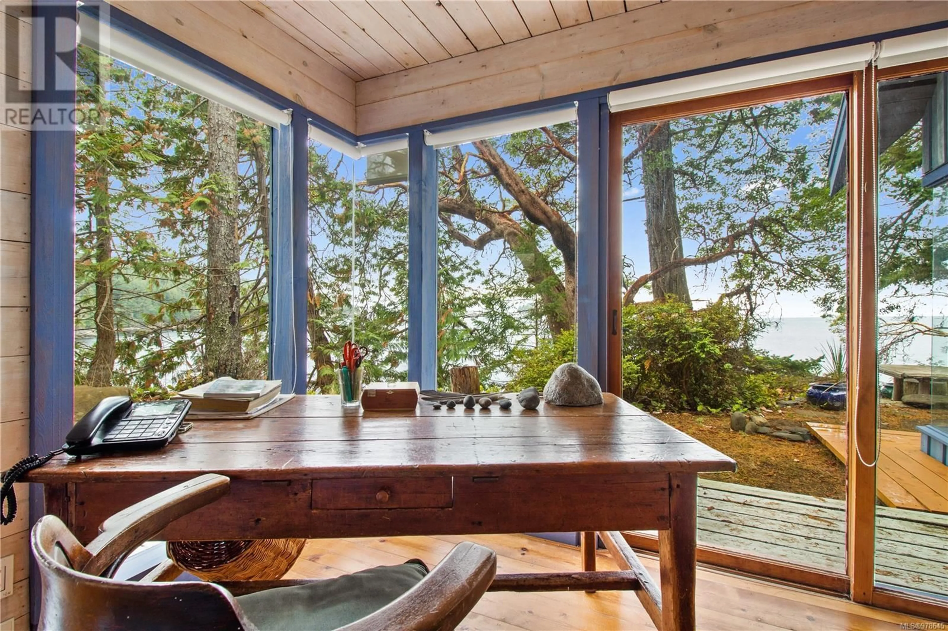 Dining room, wood floors, cottage for 39 Spring Bay Rd, Lasqueti Island British Columbia V0R2J0