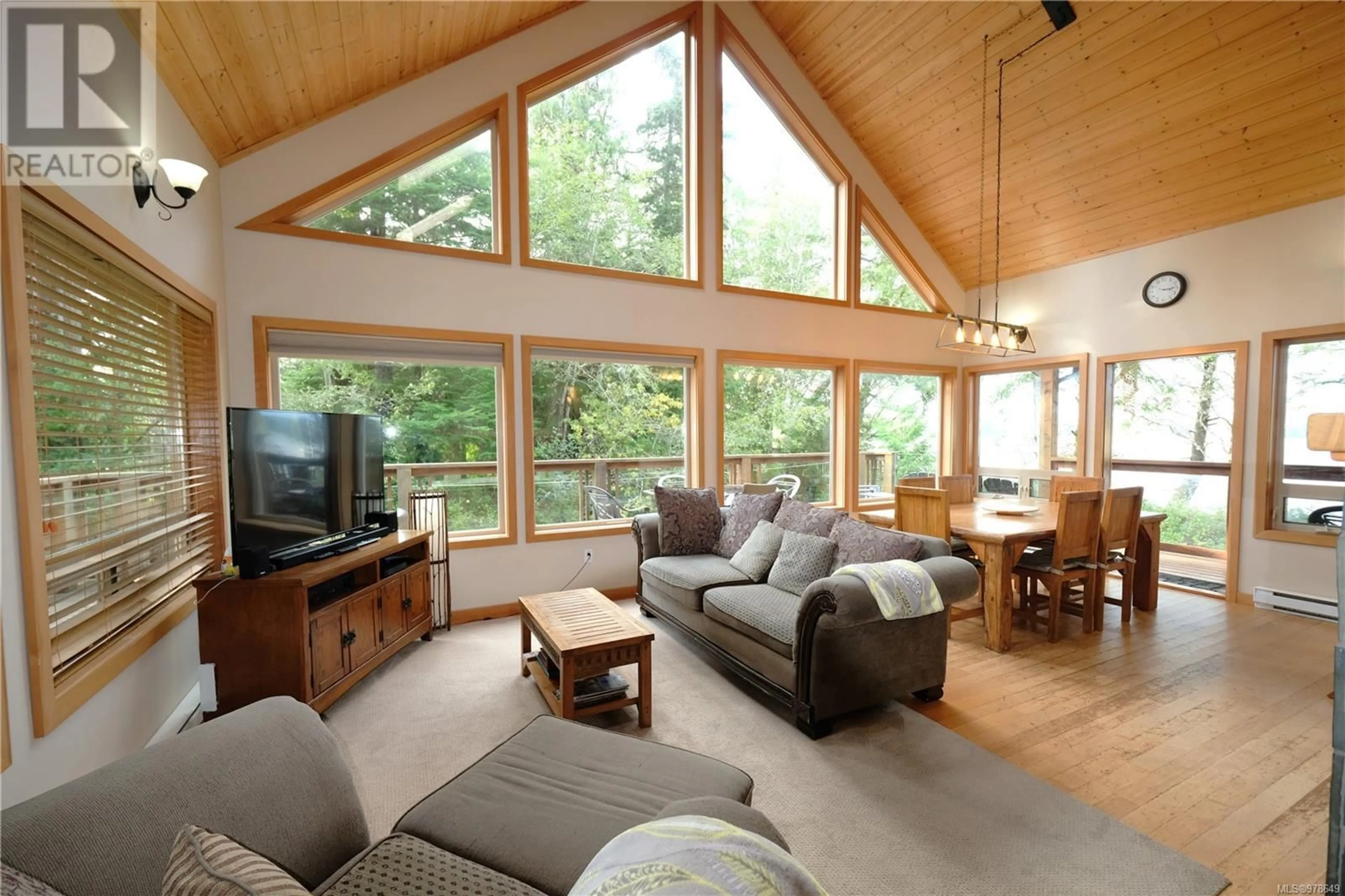 Living room, wood floors for 1027 Jensens Bay Rd, Tofino British Columbia V0R2Z0