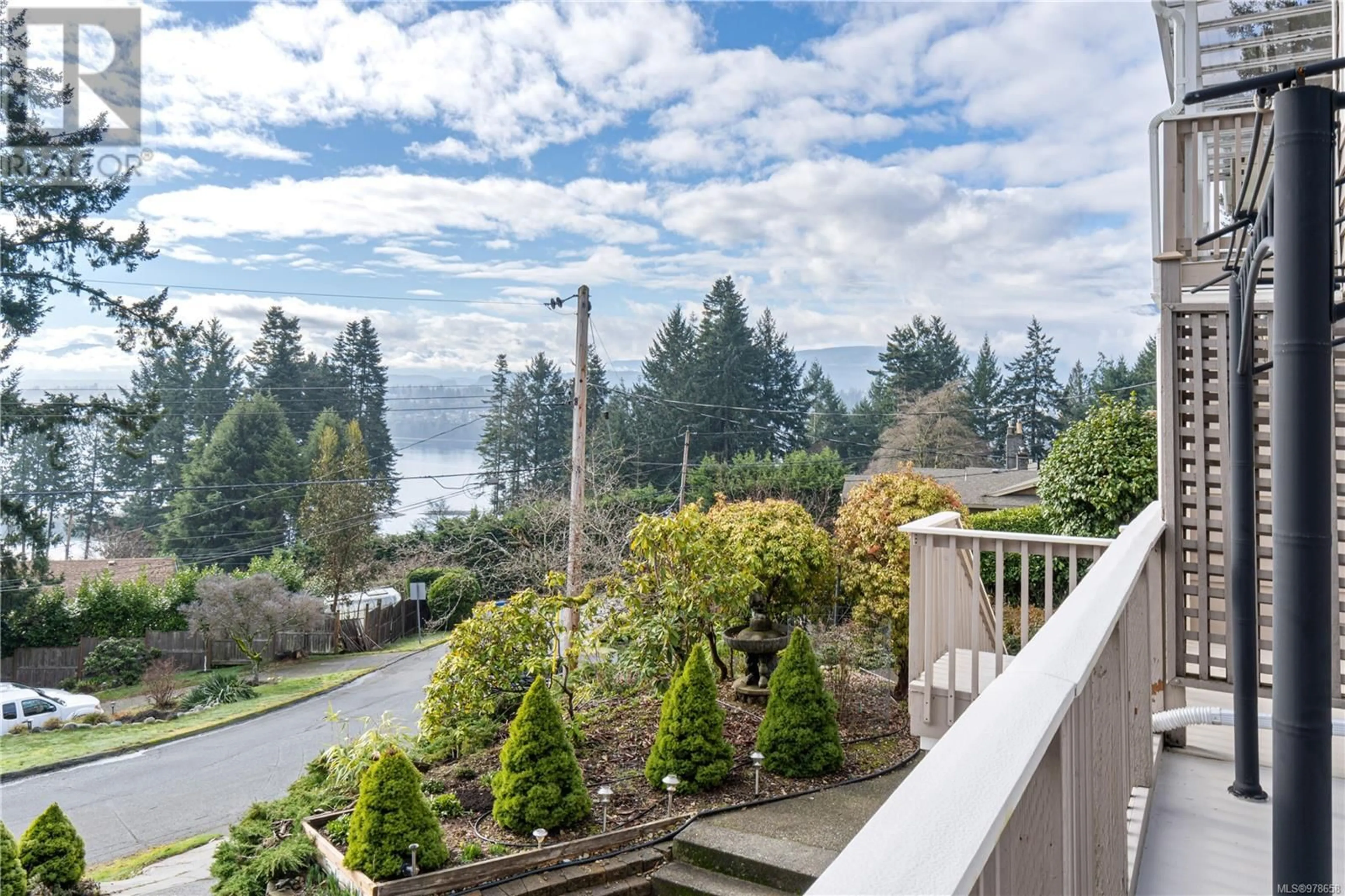 Patio, the fenced backyard for 133 Cross Bow Dr, Nanaimo British Columbia V9T1L2