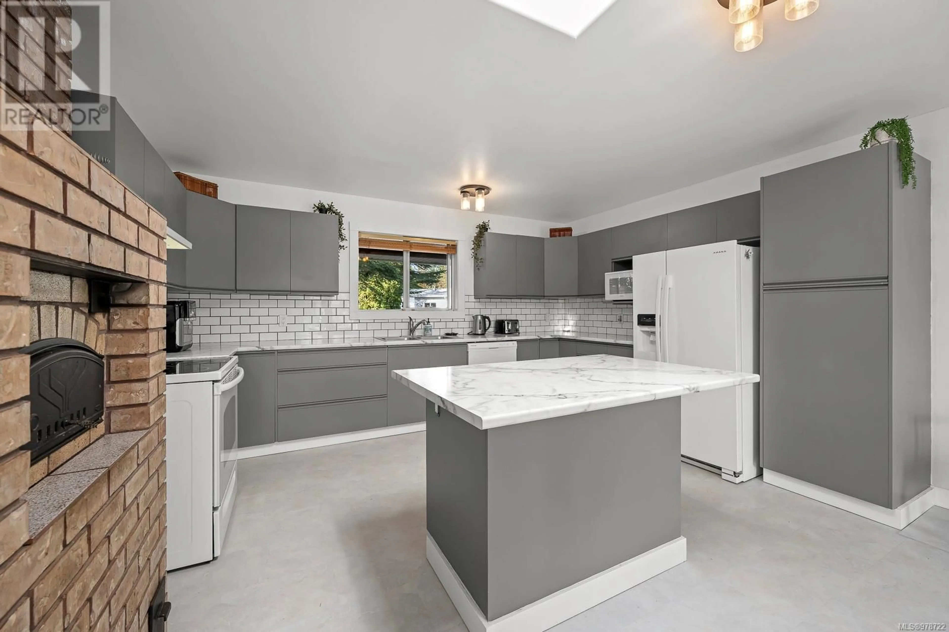 Contemporary kitchen, ceramic floors, cottage for 65 Islewood Dr, Bowser British Columbia V0R1G0