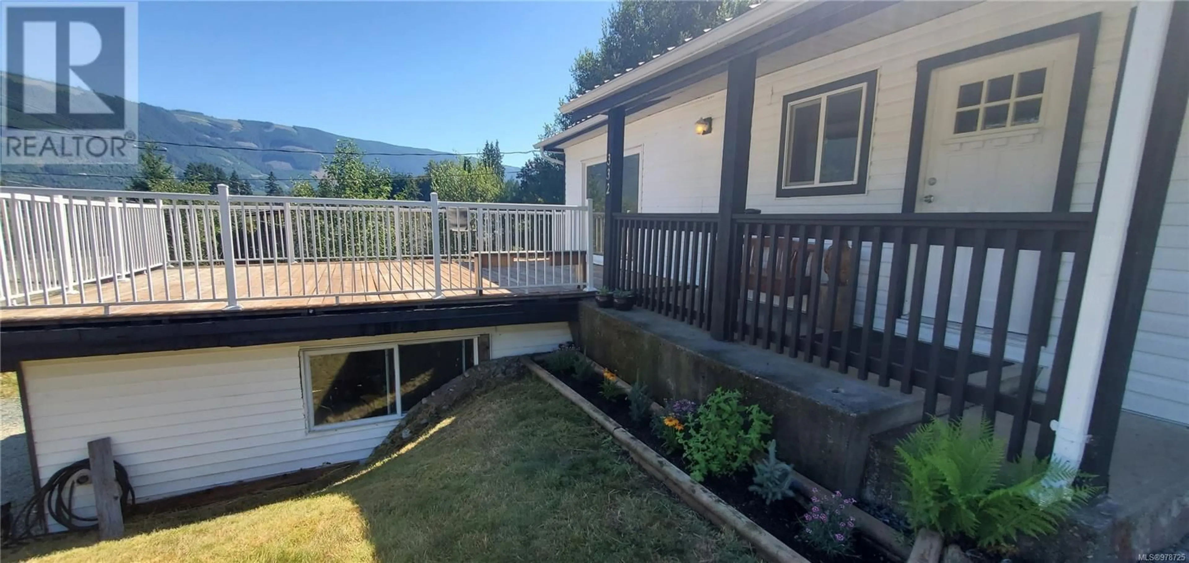 A pic from exterior of the house or condo, the fenced backyard for 332 South Shore Rd, Lake Cowichan British Columbia V0R2G0