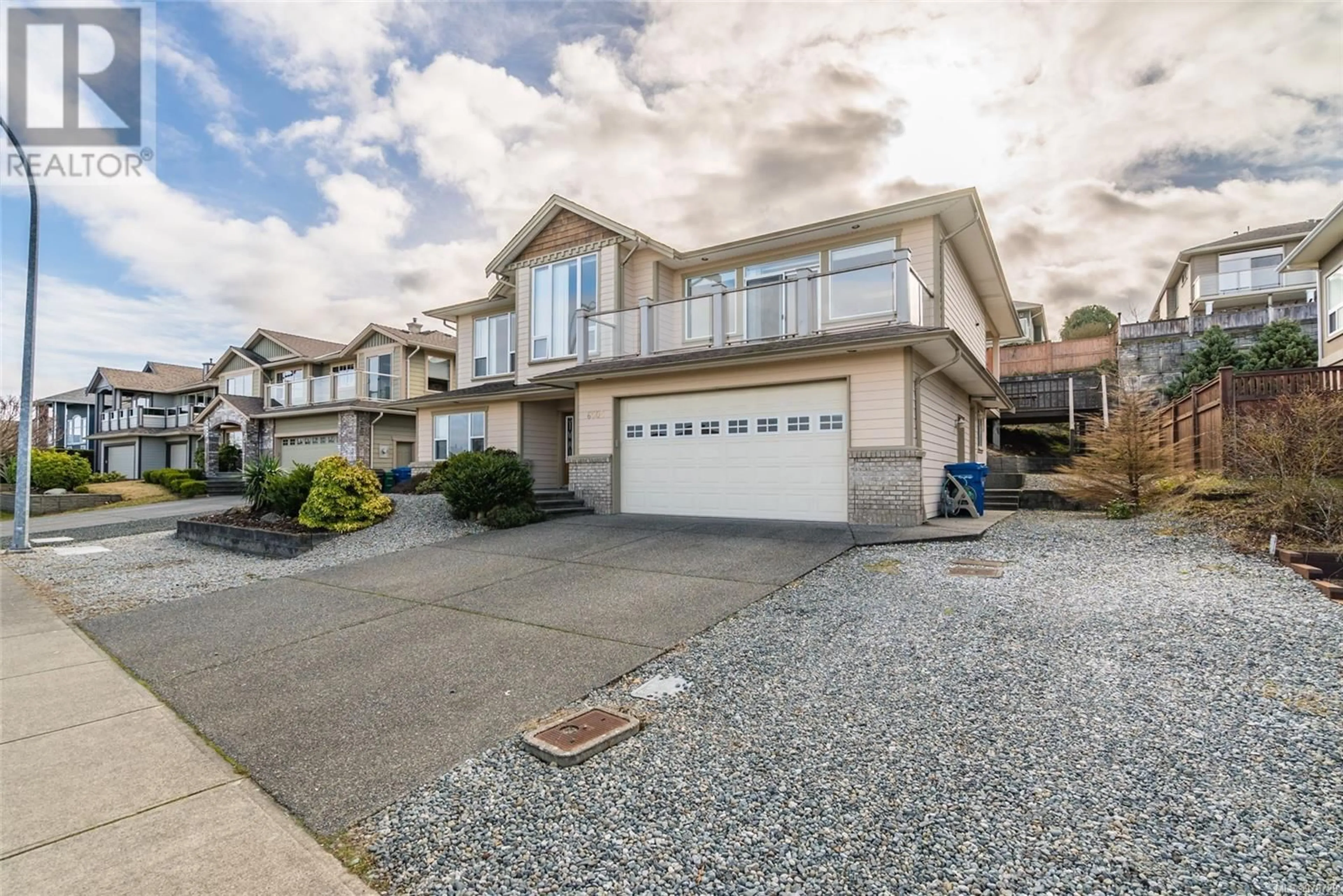 A pic from exterior of the house or condo, the street view for 6505 Peregrine Rd, Nanaimo British Columbia V9V1V5