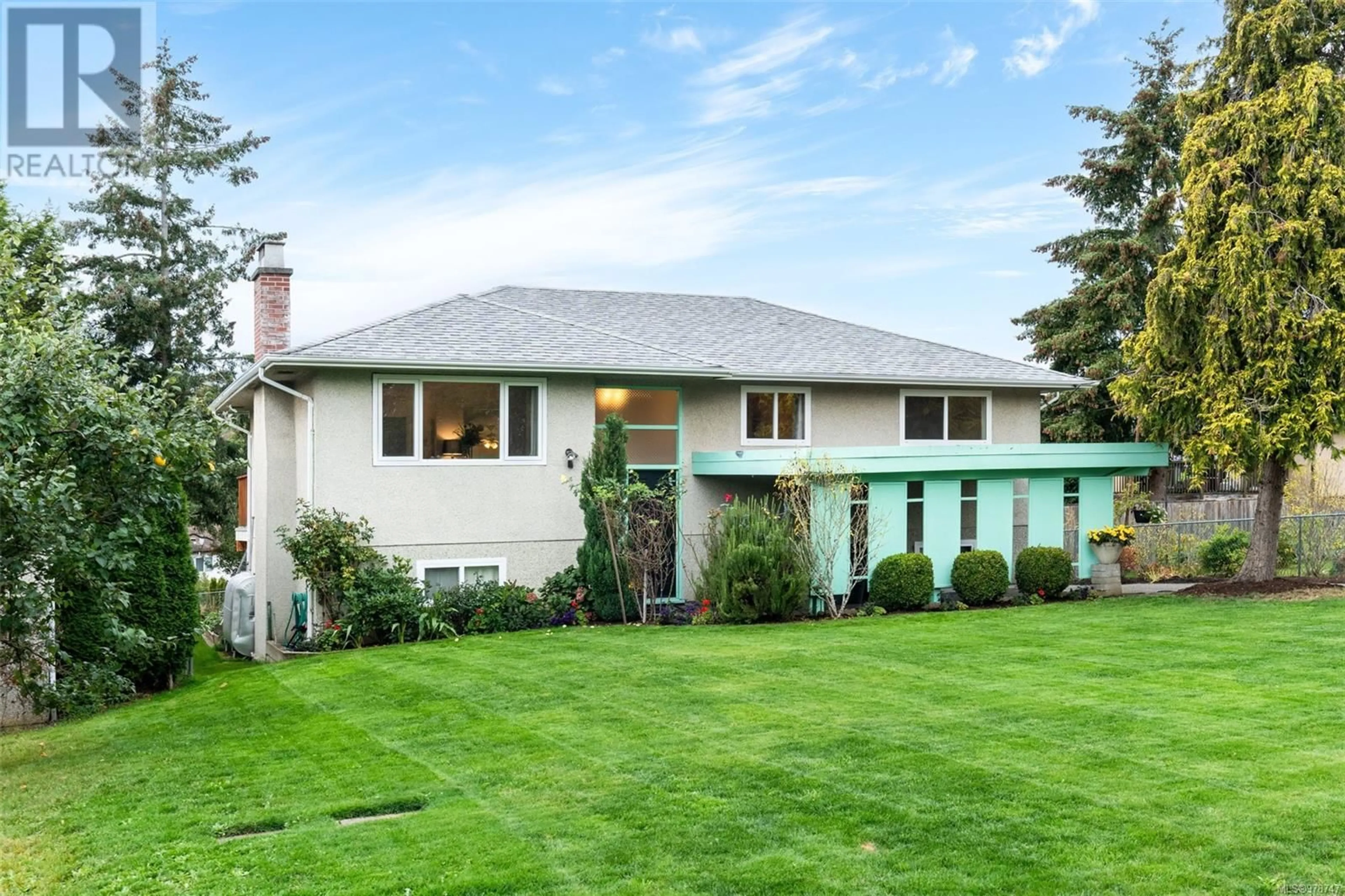 Frontside or backside of a home, the fenced backyard for 4068 Borden St, Saanich British Columbia V8X2G1