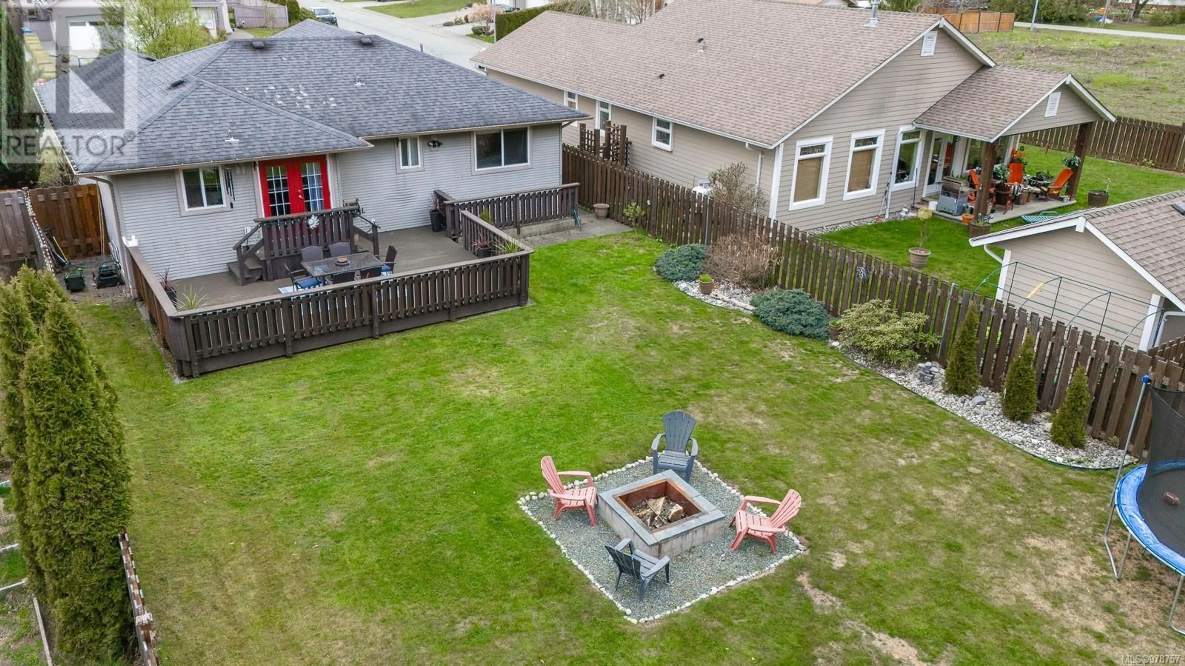 Patio, the fenced backyard for 5527 Woodland Cres E, Port Alberni British Columbia V9Y8E6