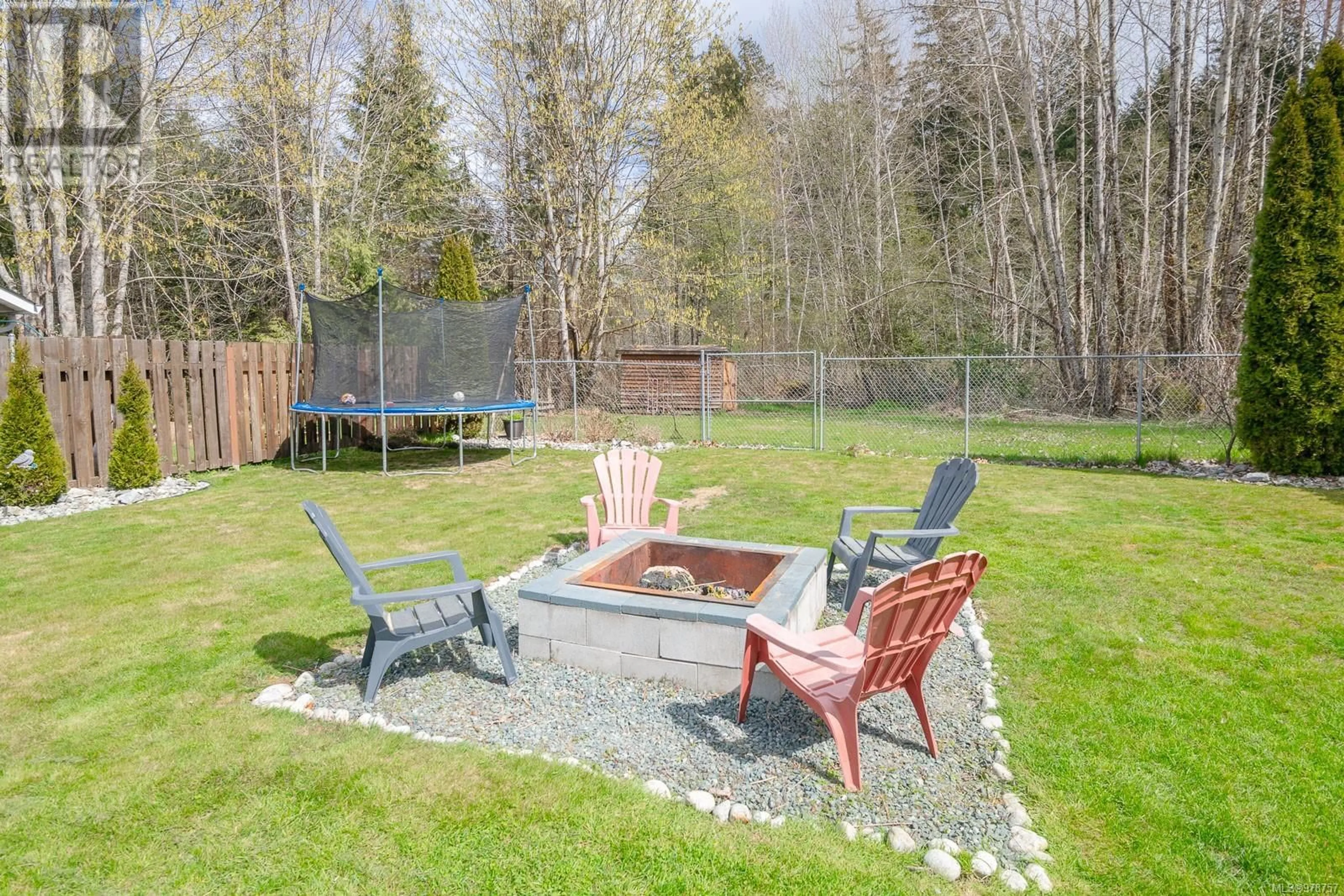 Patio, the fenced backyard for 5527 Woodland Cres E, Port Alberni British Columbia V9Y8E6