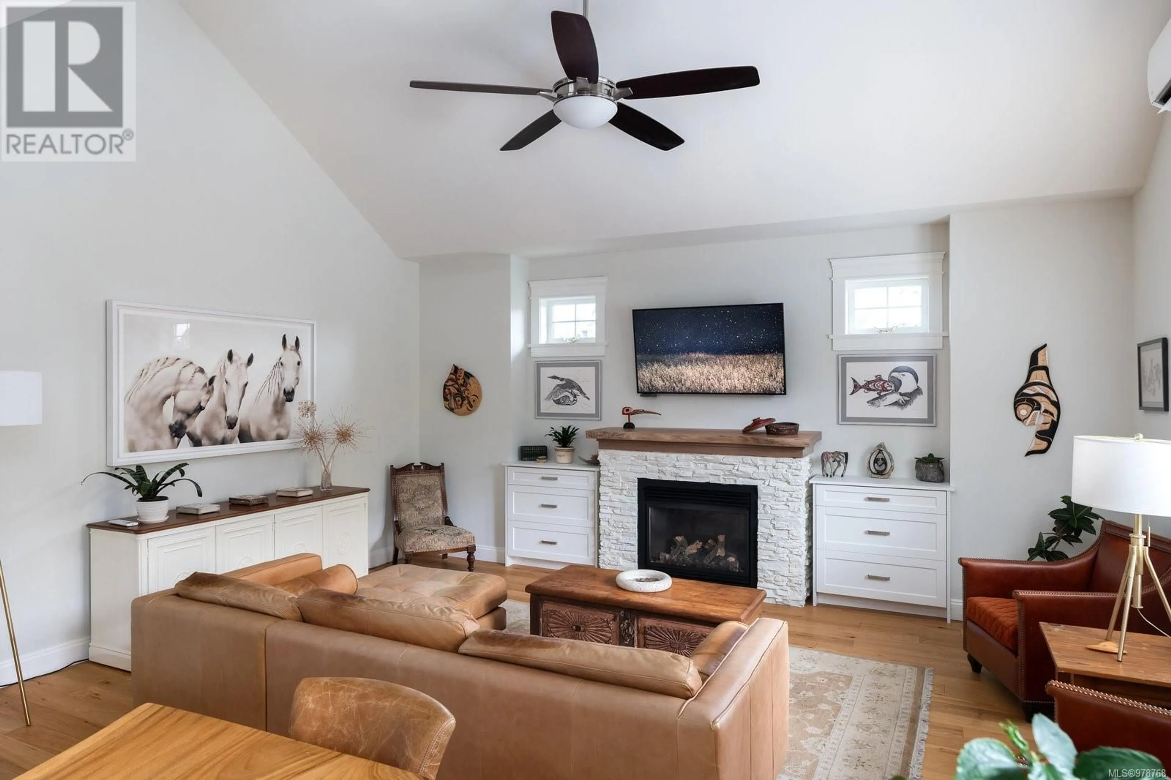 Living room, wood floors for 101 10500 McDonald Park Rd, Sidney British Columbia V8L0B6