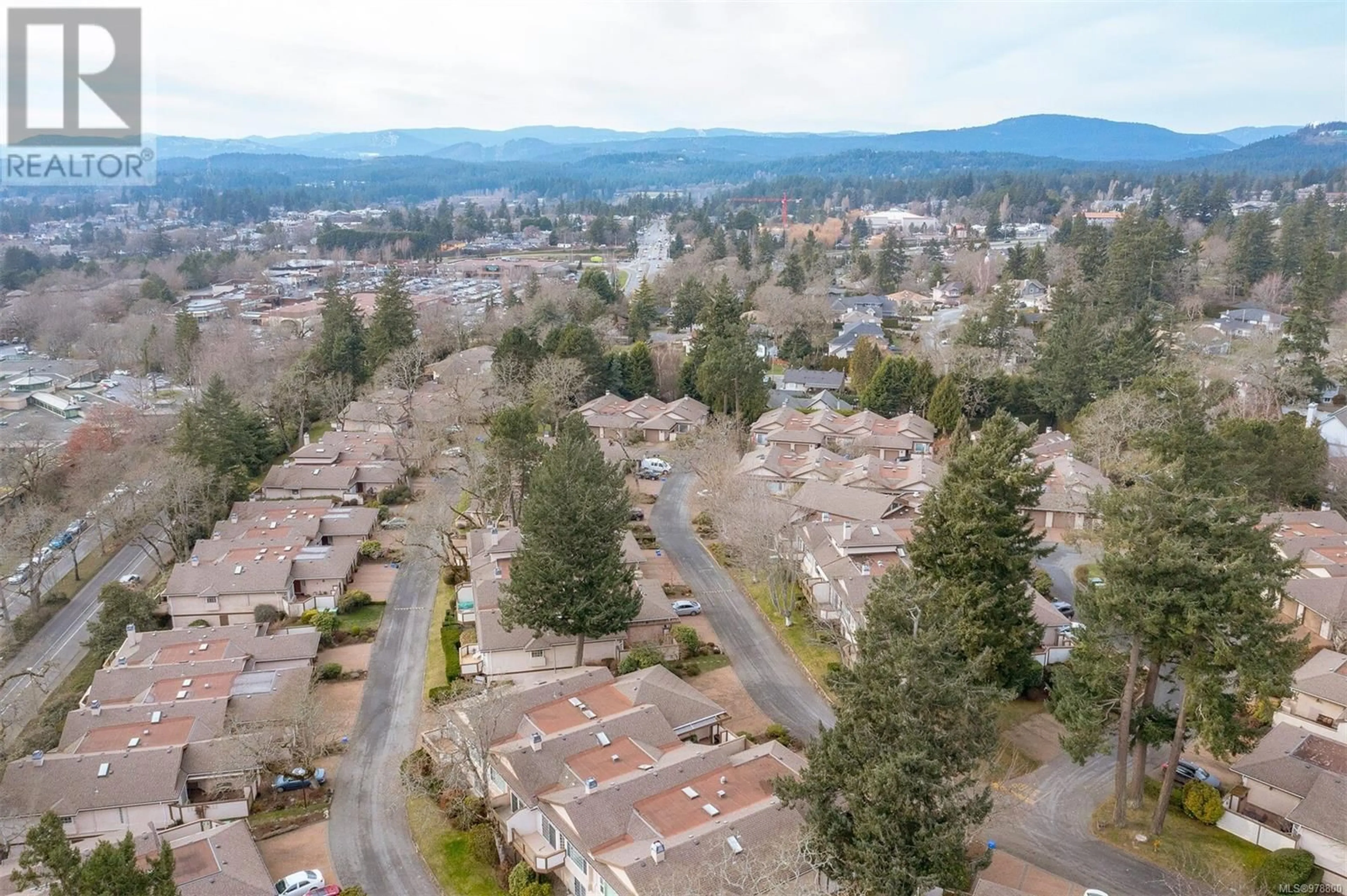 A pic from exterior of the house or condo, the street view for 19 901 Kentwood Lane, Saanich British Columbia V8Y2Y6