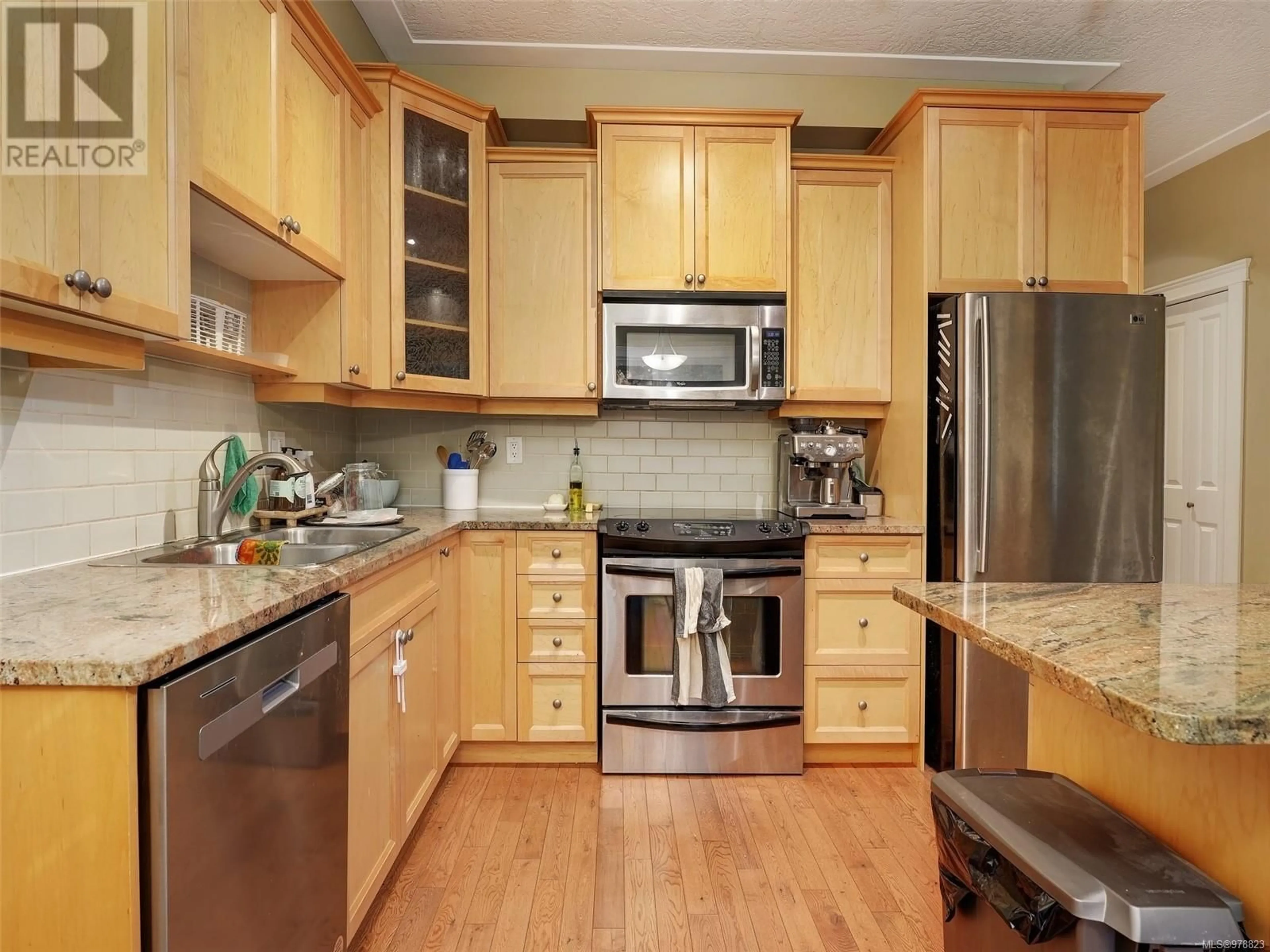 Standard kitchen, wood floors for 9 6961 East Saanich Rd, Central Saanich British Columbia V8Z0A9