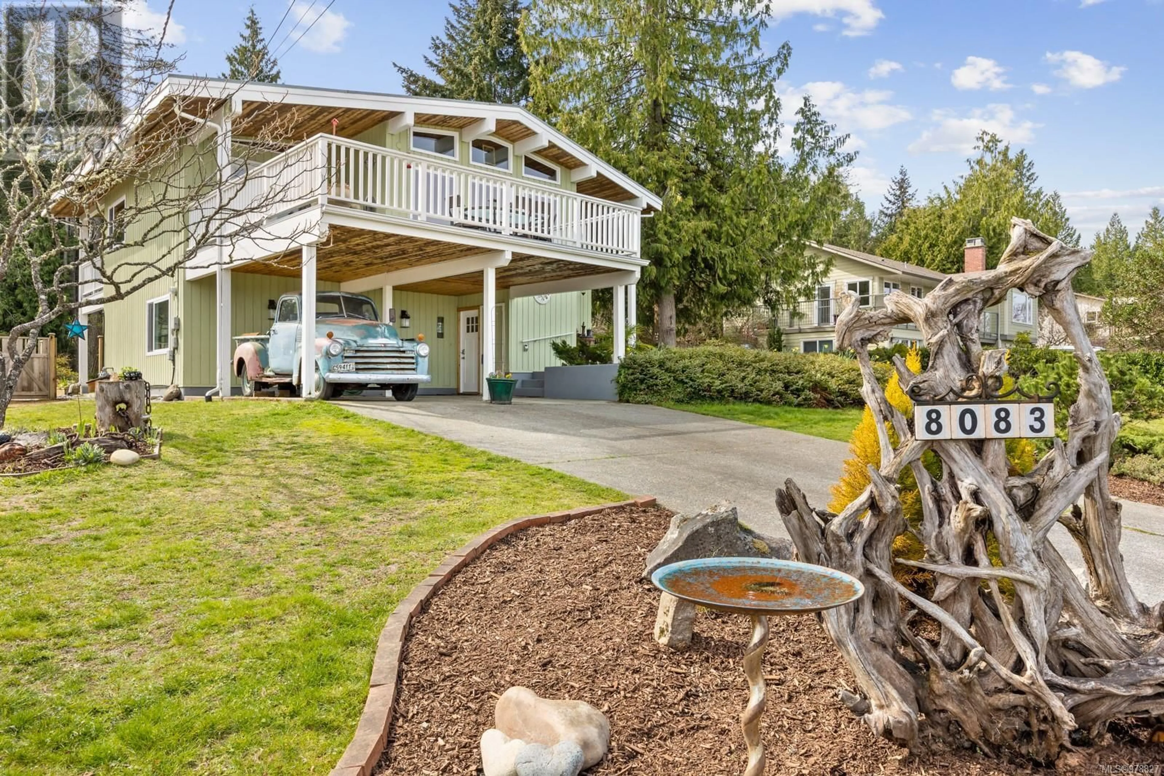 Frontside or backside of a home, the fenced backyard for 8083 Southwind Dr, Lantzville British Columbia V0R2H0