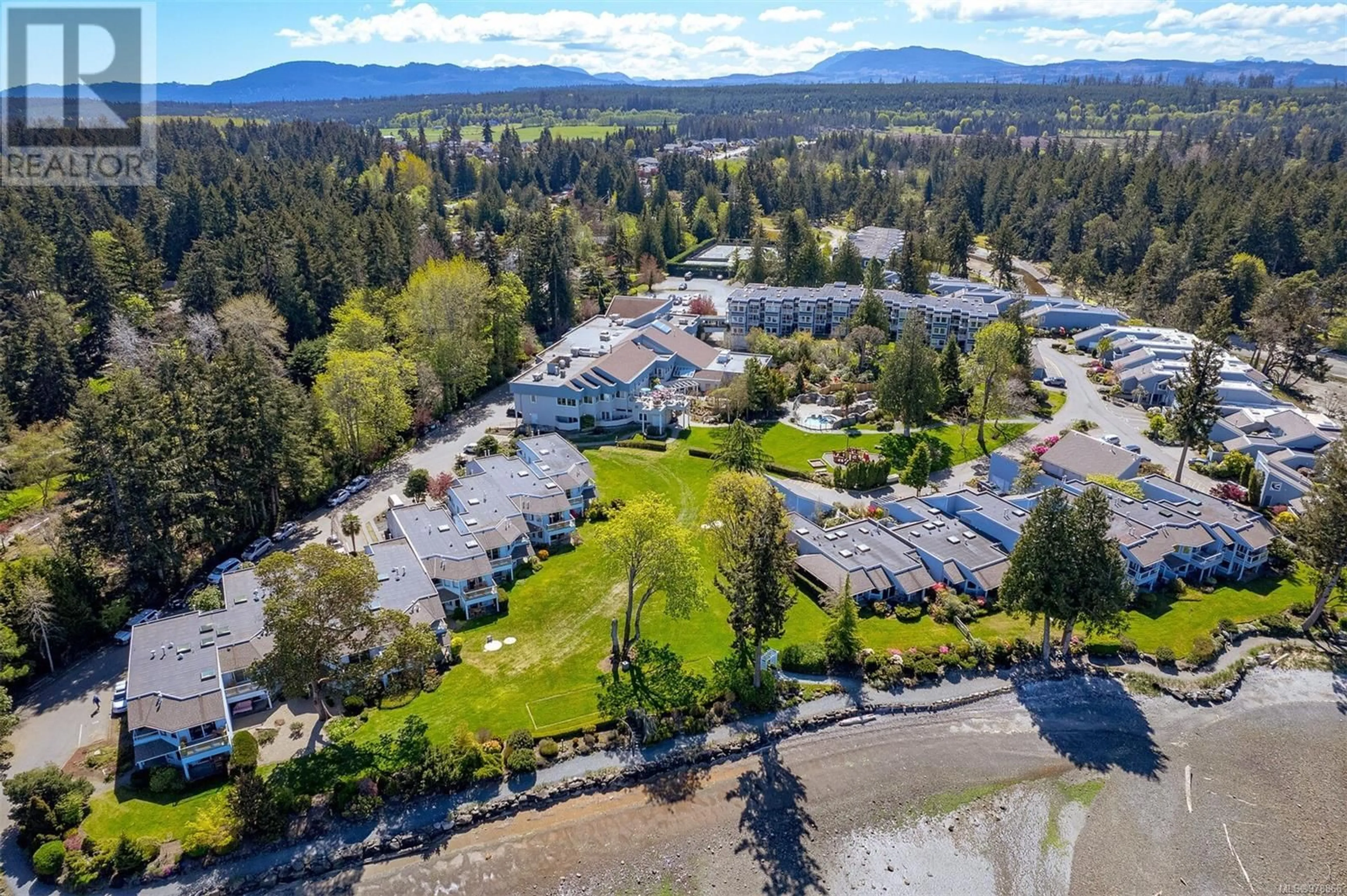 A pic from outside/outdoor area/front of a property/back of a property/a pic from drone, mountain view for 726 - 1600 STROULGER ROAD, Nanoose Bay British Columbia V9P9B7