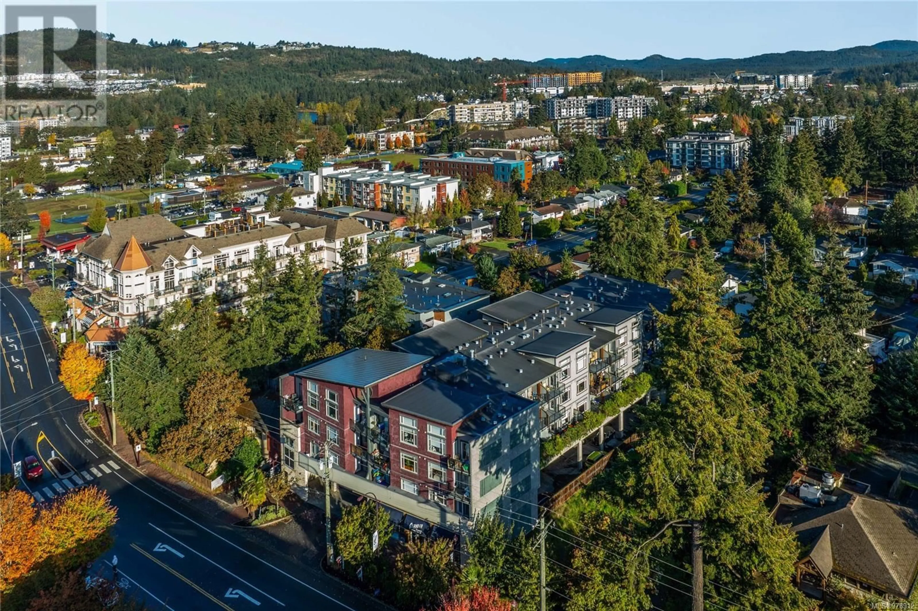 A pic from exterior of the house or condo, the view of city buildings for 204 844 Goldstream Ave, Langford British Columbia V9B2X8