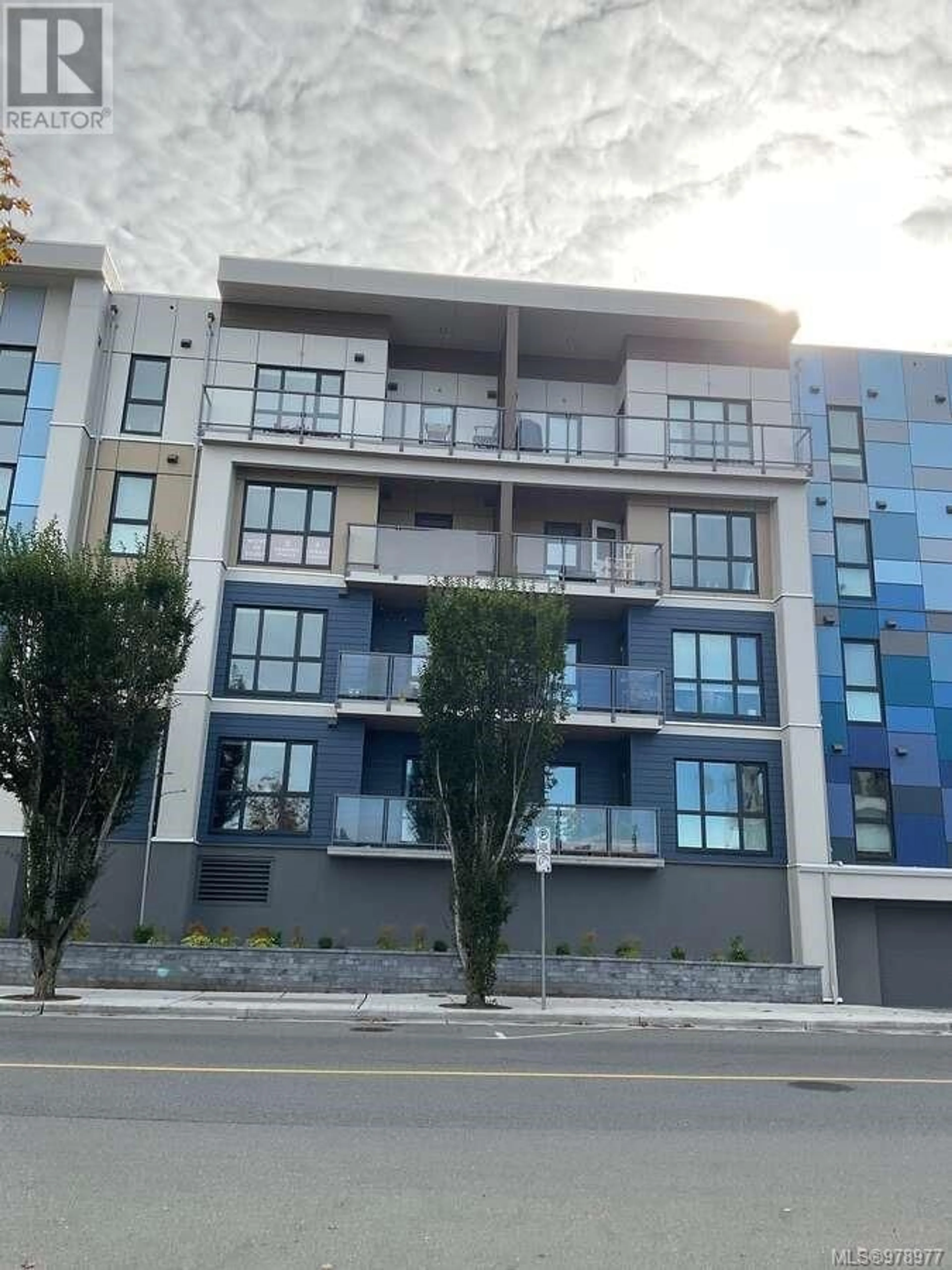 A pic from outside/outdoor area/front of a property/back of a property/a pic from drone, street for 409 - 120 JENSEN AVENUE, Parksville British Columbia V9P0H6