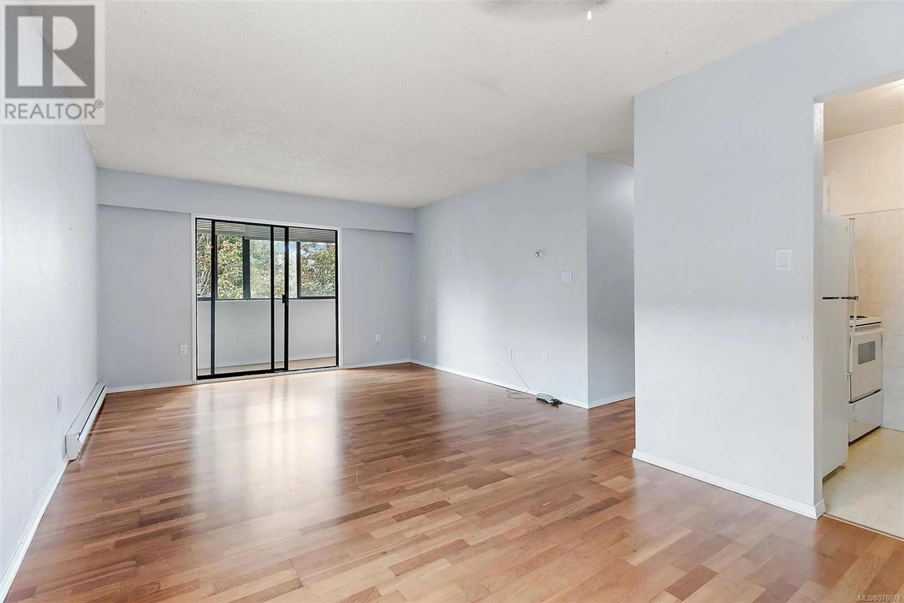 A pic of a room, wood floors for 302 2610 Graham St, Victoria British Columbia V8T3Y9