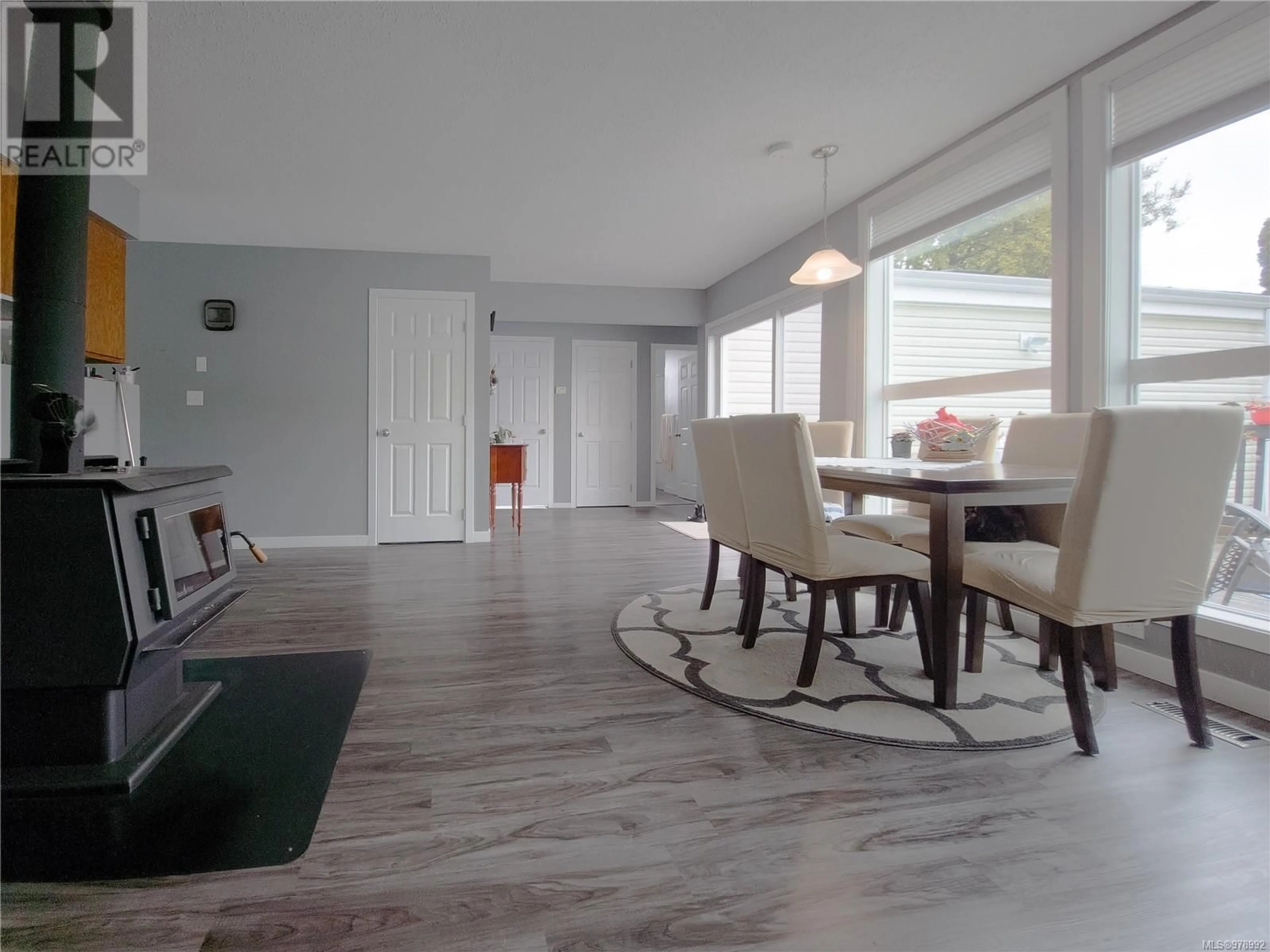 A pic of a room, wood floors for 7100 Highland Dr, Port Hardy British Columbia V0N2P0