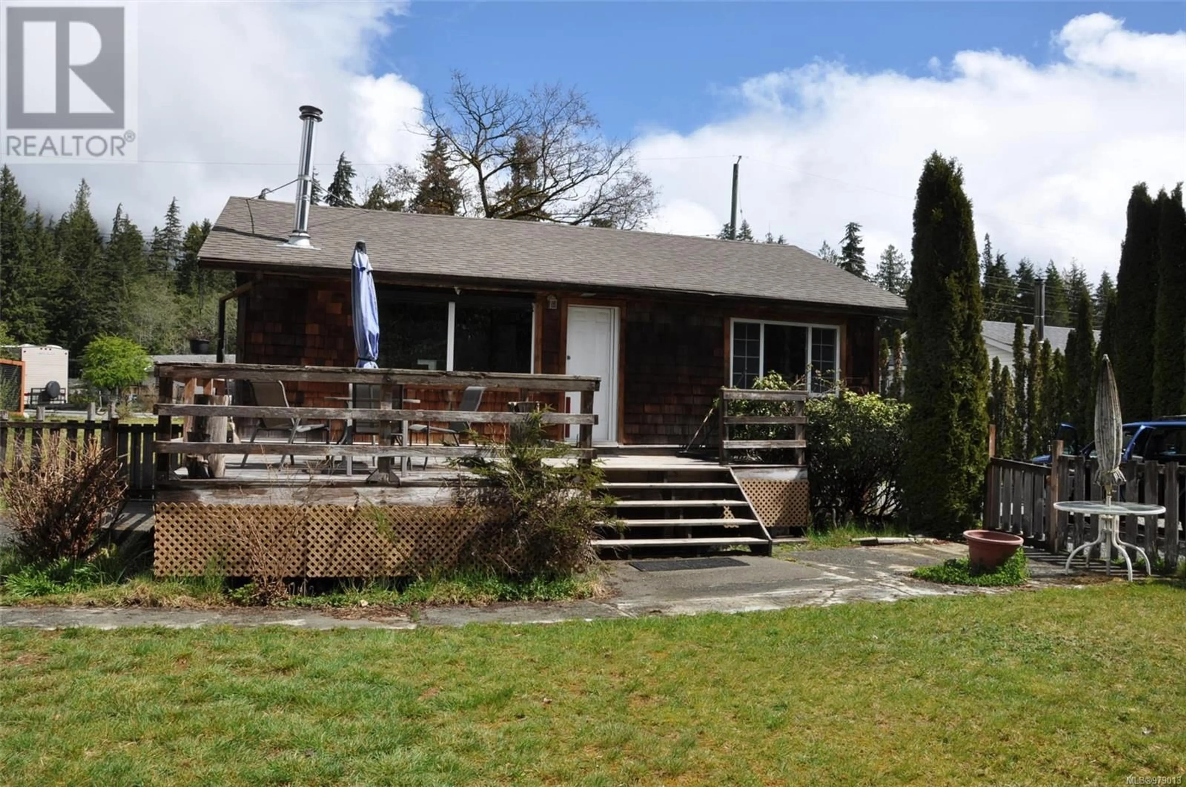 Frontside or backside of a home, cottage for 4069 Nimpkish Cres, Woss British Columbia V0N3P0