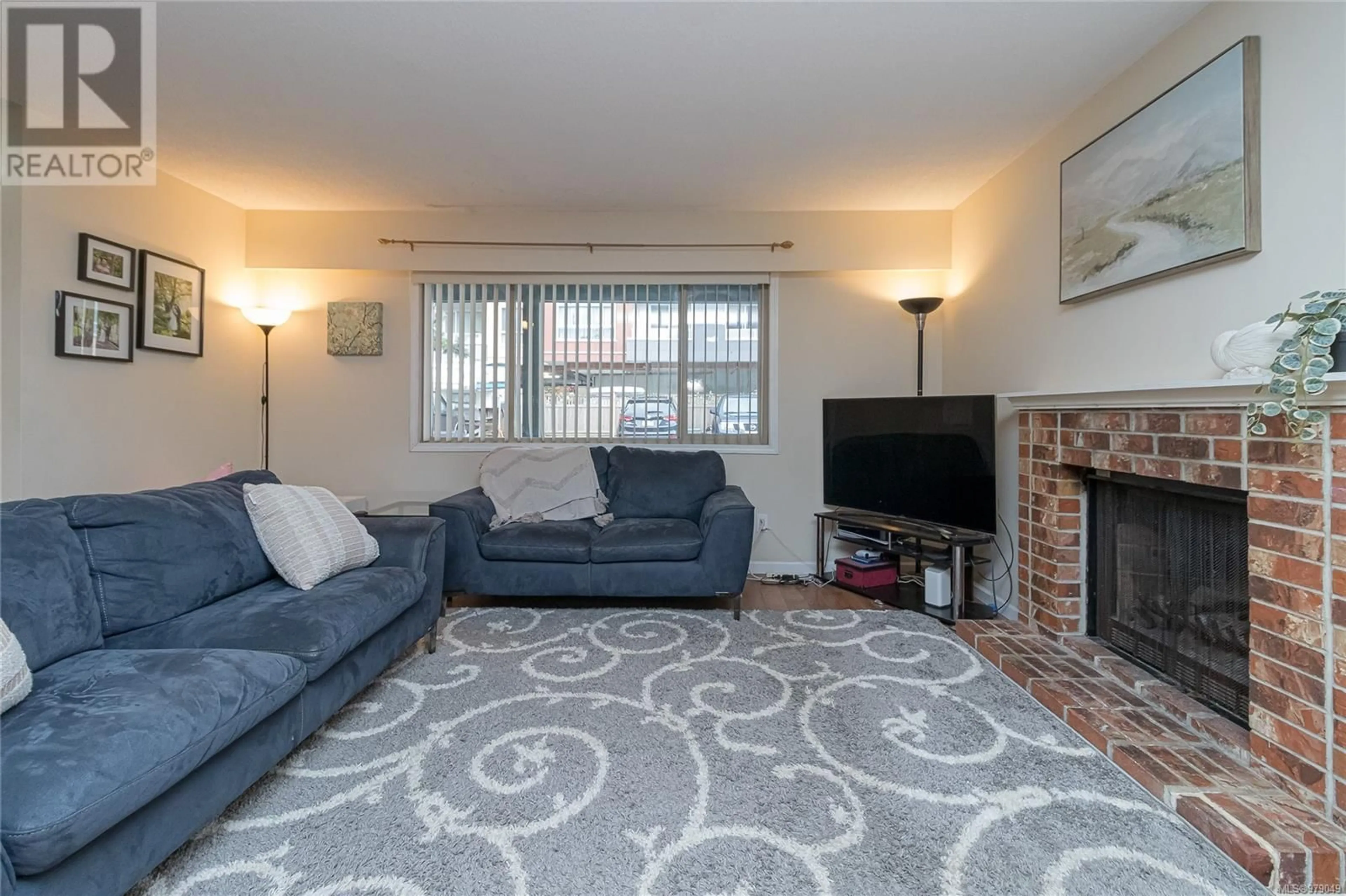 Living room, carpet floors for 111 2763 Jacklin Rd, Langford British Columbia V9B3X7