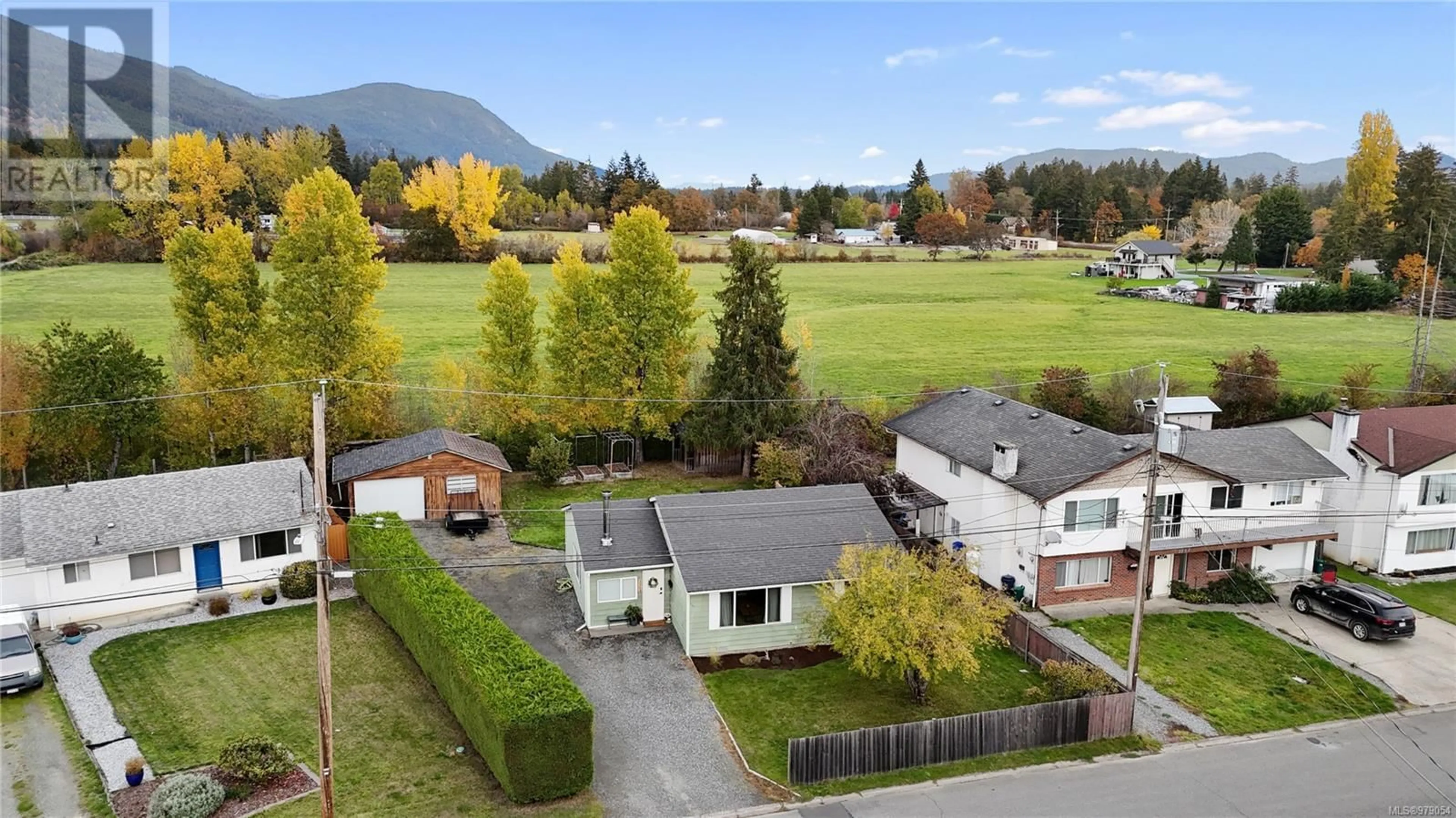 Frontside or backside of a home, the fenced backyard for 3363 Hawkes Blvd, Duncan British Columbia V9L4S7