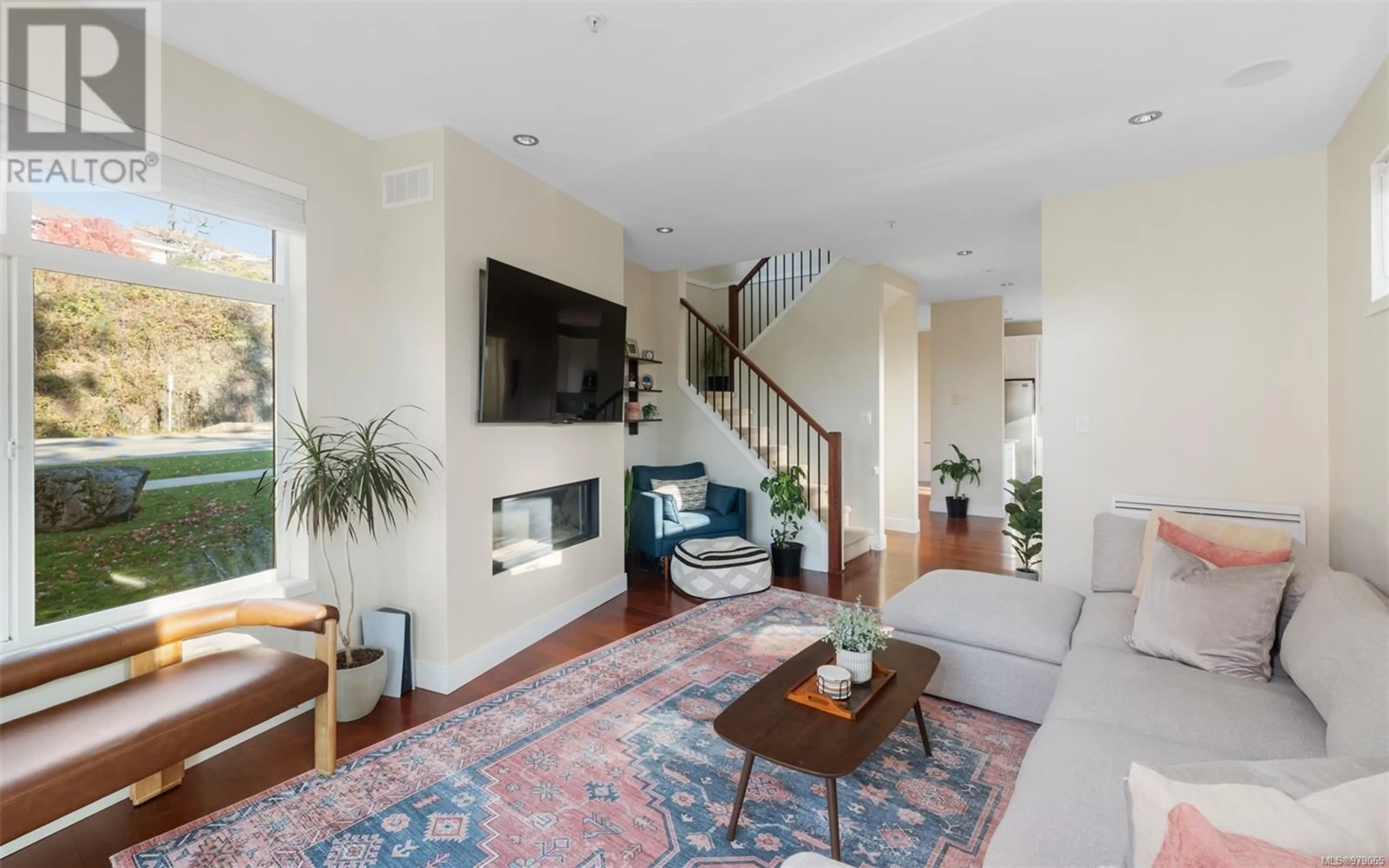 Living room, wood floors for 10 2311 Watkiss Way, View Royal British Columbia V9B6J6