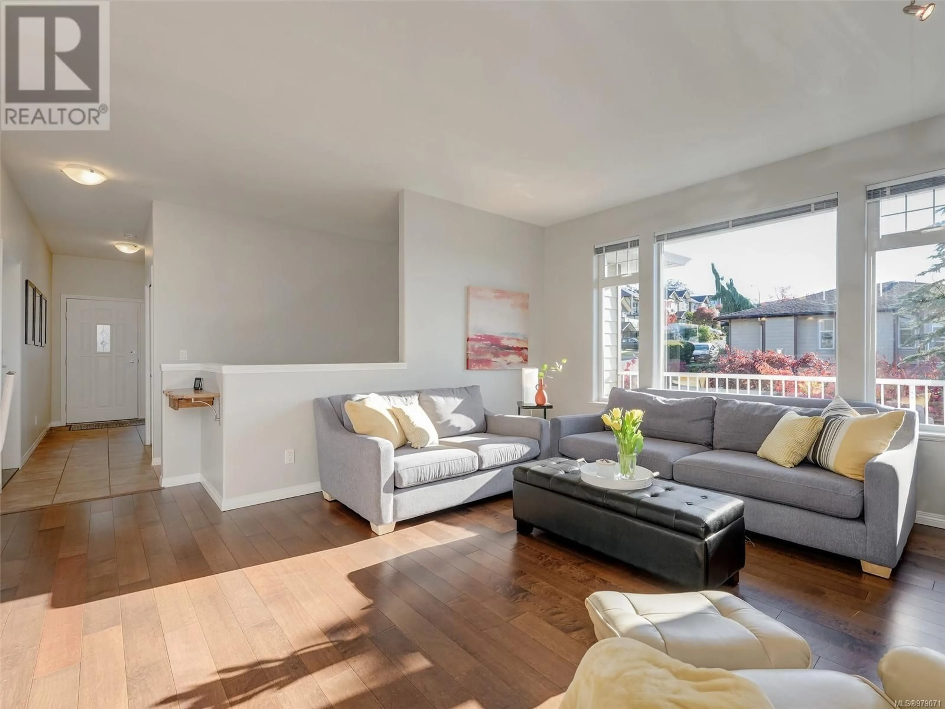 Living room, wood floors for 21 759 Sanctuary Crt, Saanich British Columbia V8X5L6