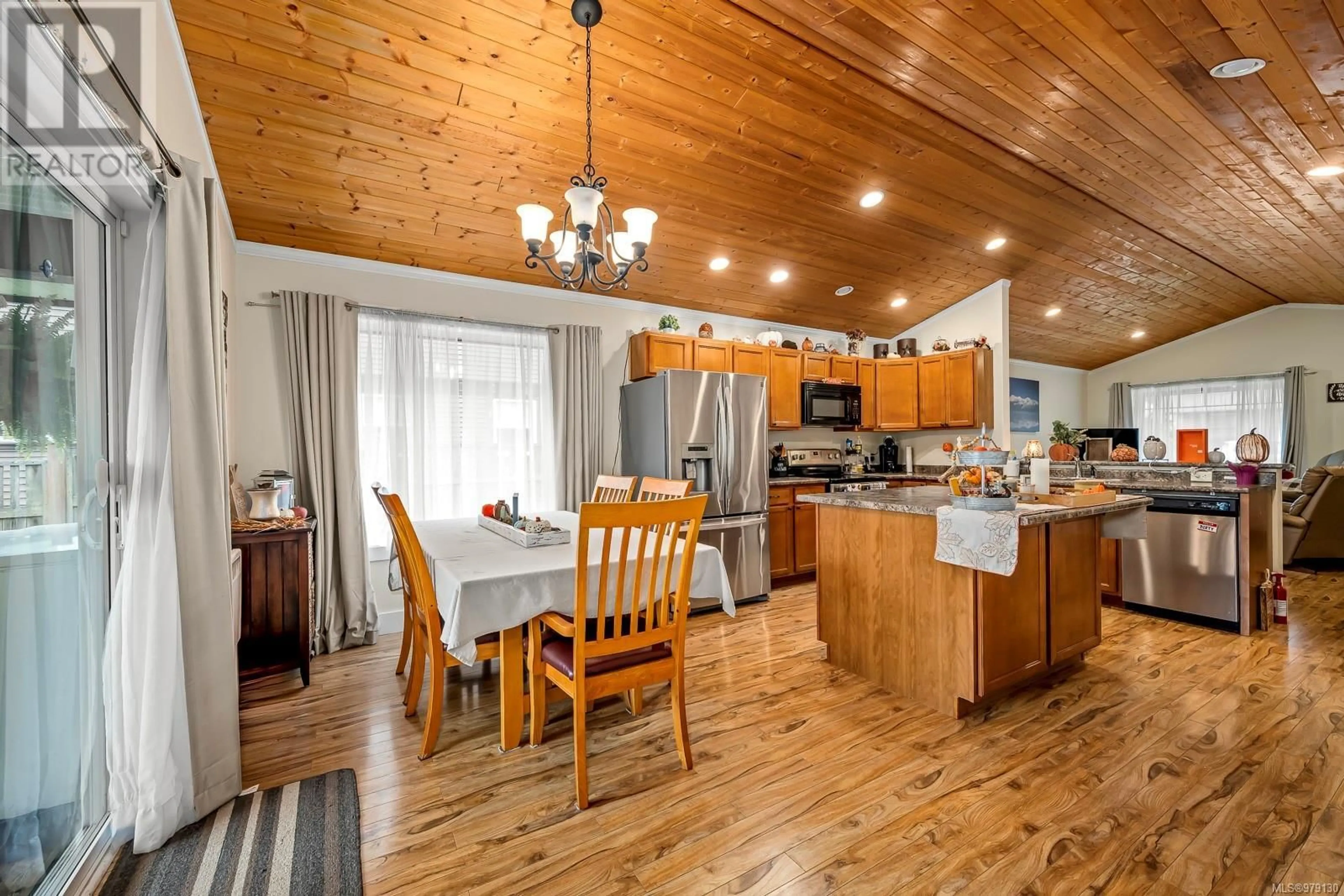 Open concept kitchen for 5586 Swallow Dr, Port Alberni British Columbia V9Y7H1