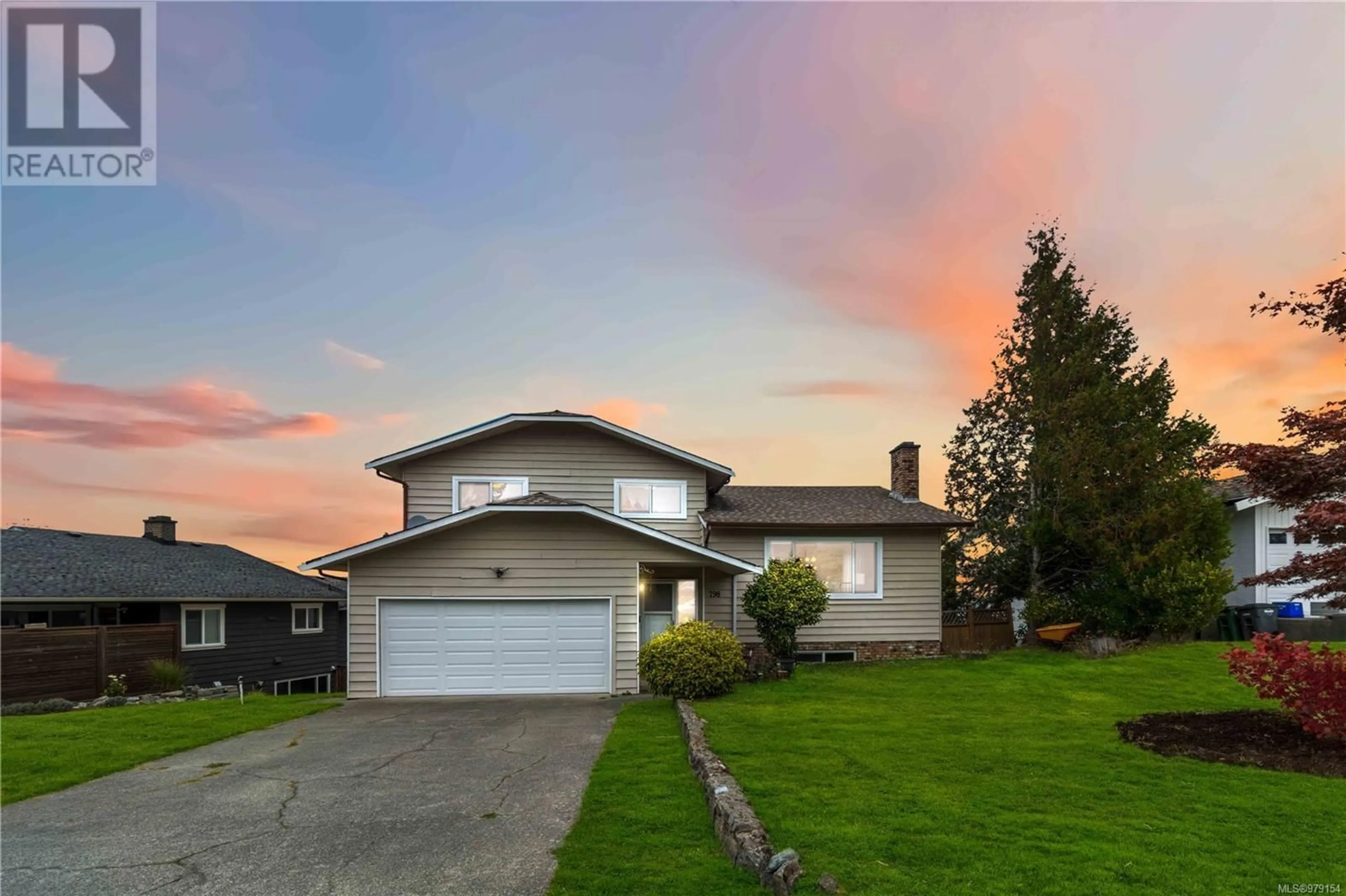 Frontside or backside of a home, the fenced backyard for 798 Killdonan Rd, Saanich British Columbia V8X4K8