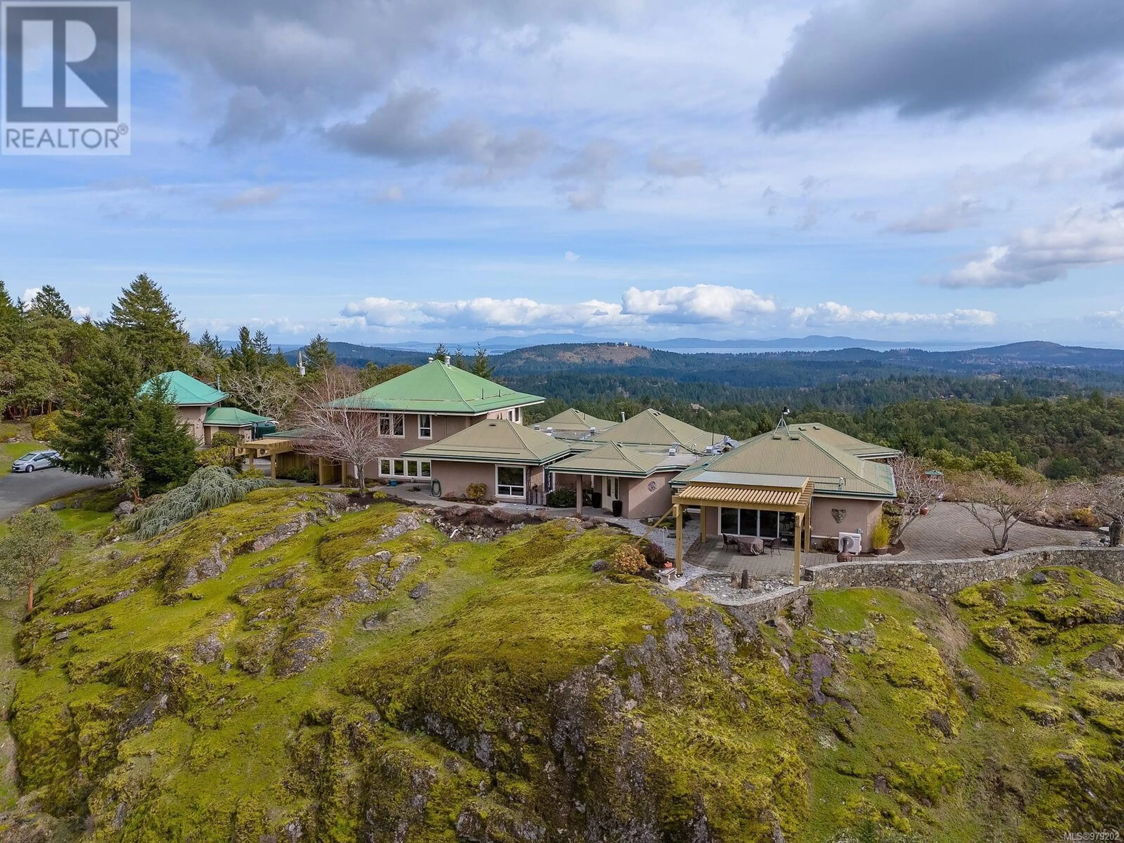A pic from outside/outdoor area/front of a property/back of a property/a pic from drone, mountain view for 4303 MUNN ROAD, Highlands British Columbia V9E1C8