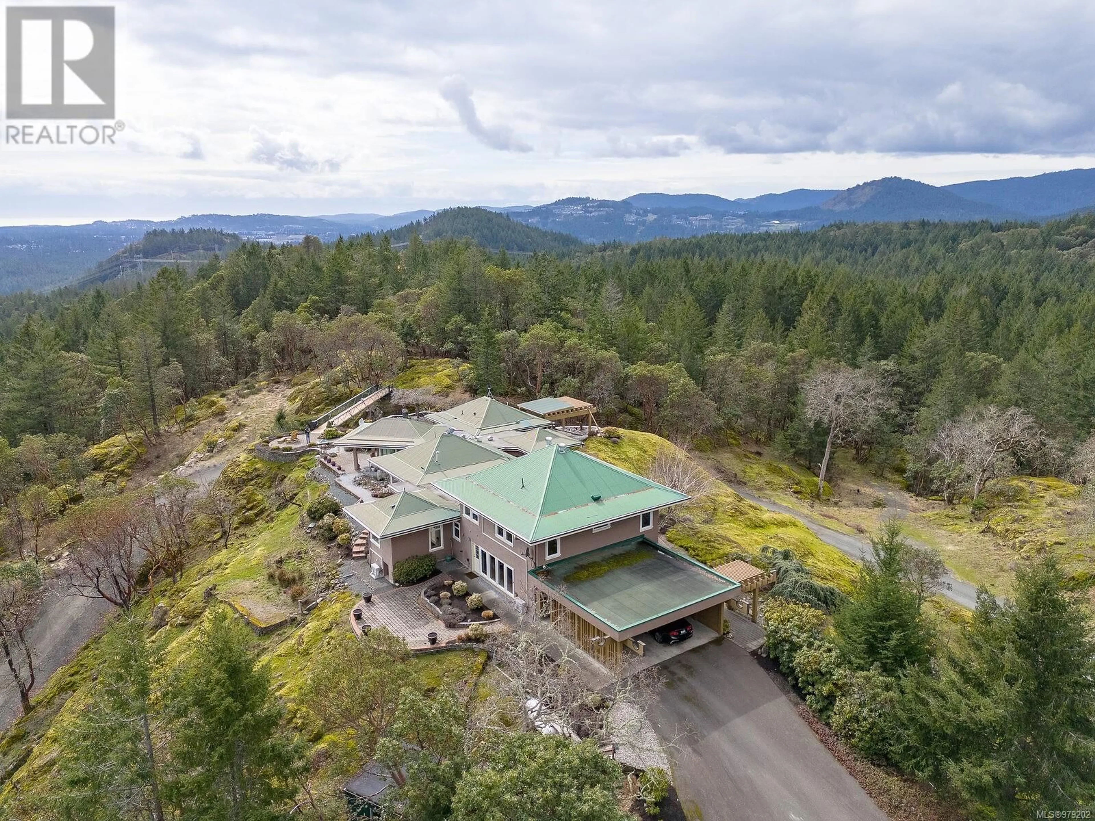 A pic from outside/outdoor area/front of a property/back of a property/a pic from drone, mountain view for 4303 MUNN ROAD, Highlands British Columbia V9E1C8