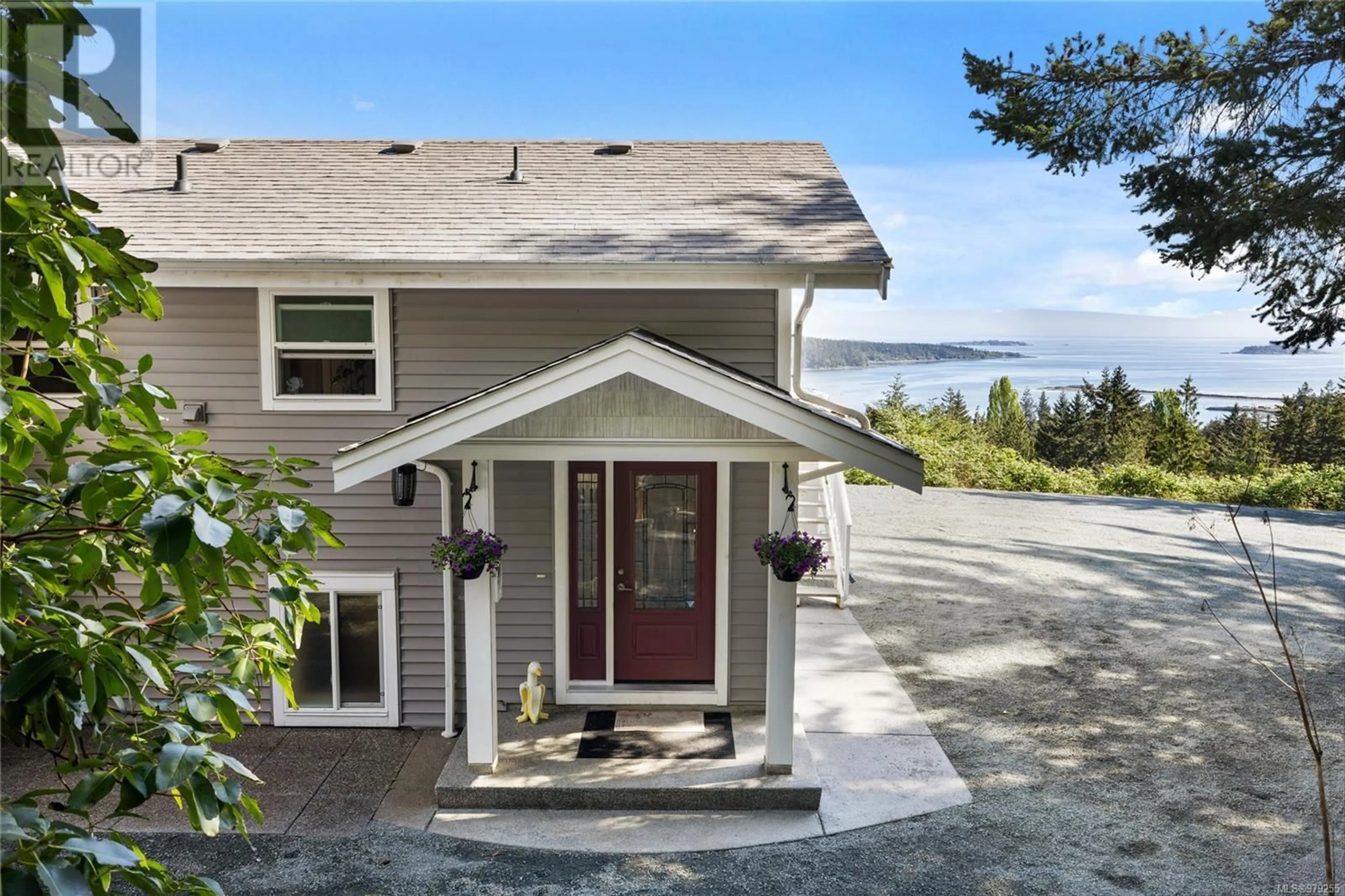 Frontside or backside of a home, cottage for 8475 Lisa Lane, Lantzville British Columbia V0R2H0