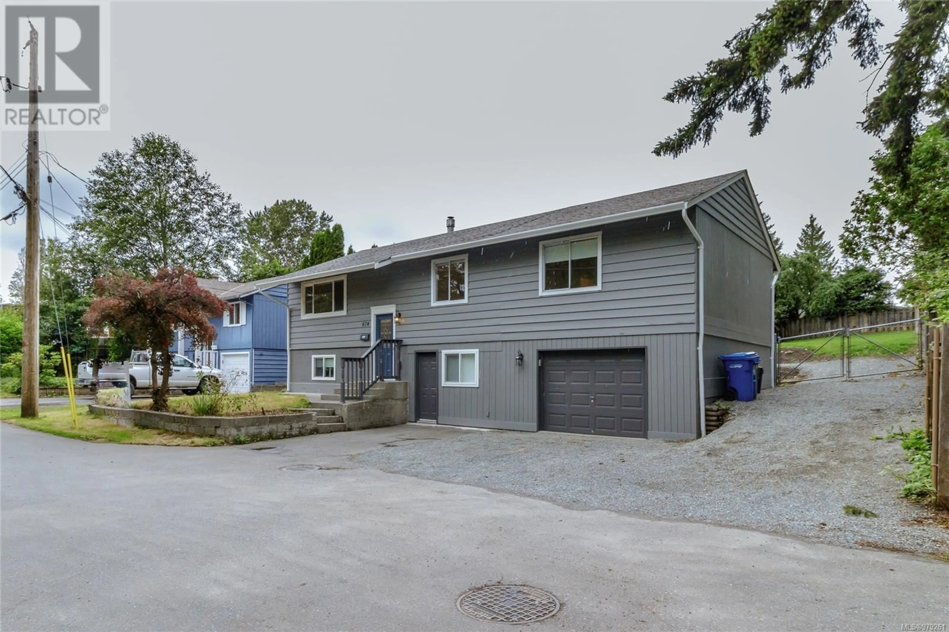 Frontside or backside of a home, the street view for 674 Beaconsfield Rd, Nanaimo British Columbia V9R1X2