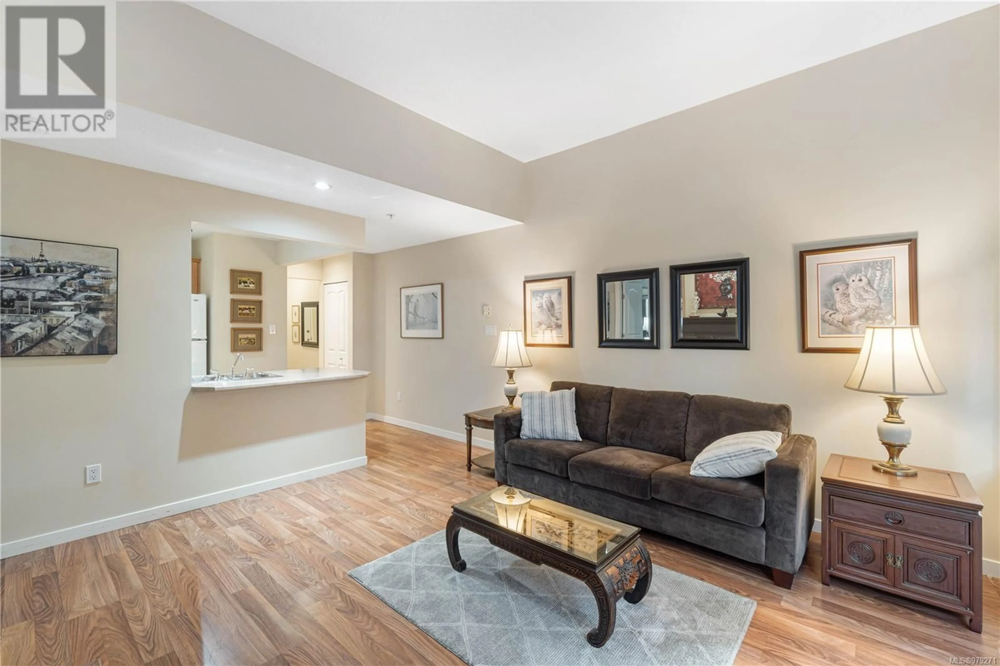 Living room, wood floors for 303 5660 Edgewater Lane, Nanaimo British Columbia V9T6K1