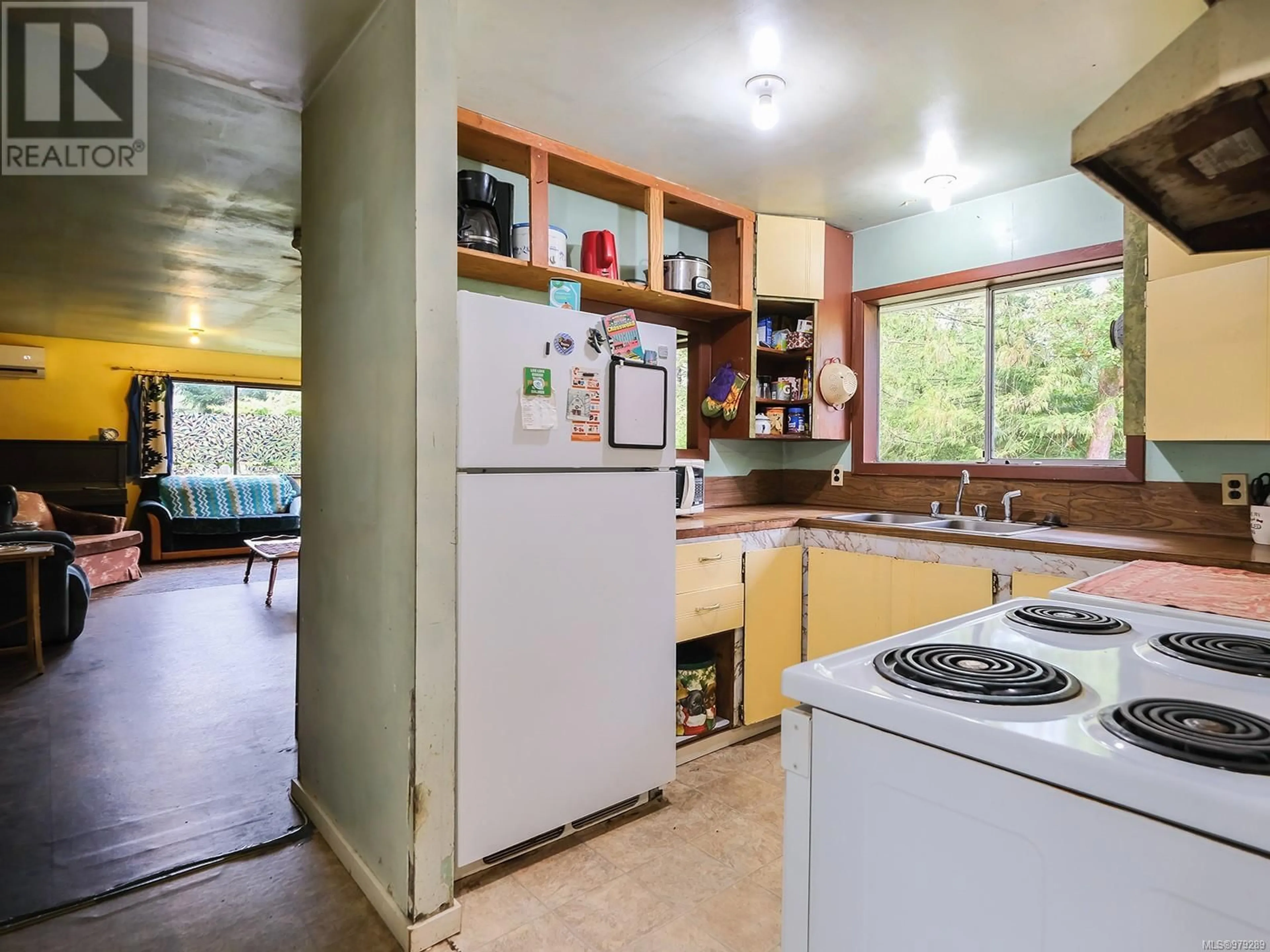 Kitchen, cement floor, cottage for 7085 Rice Rd, Duncan British Columbia V9L5W5