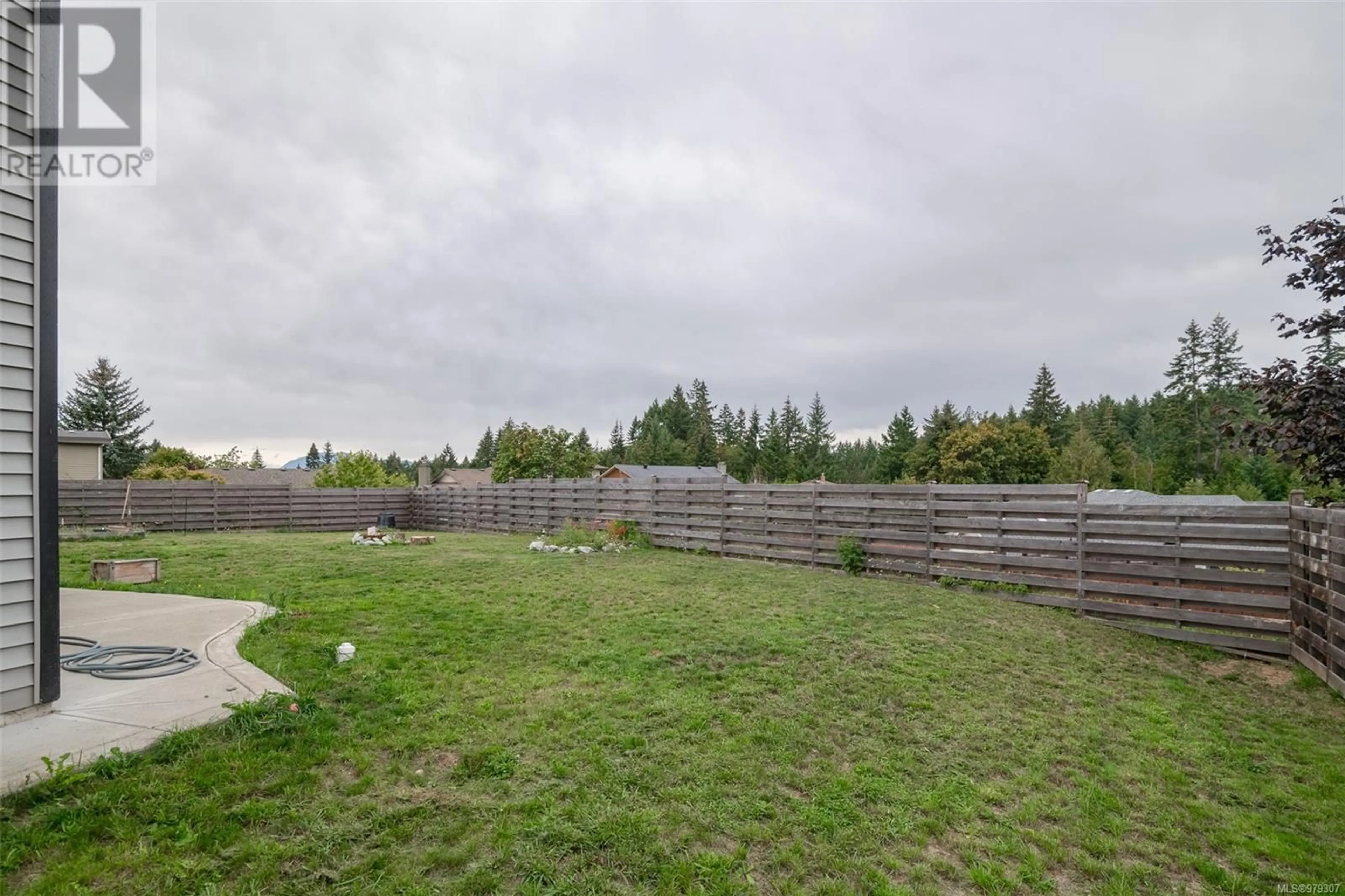 Patio, the fenced backyard for 3132 Sweet Pl, Port Alberni British Columbia V9Y2B6