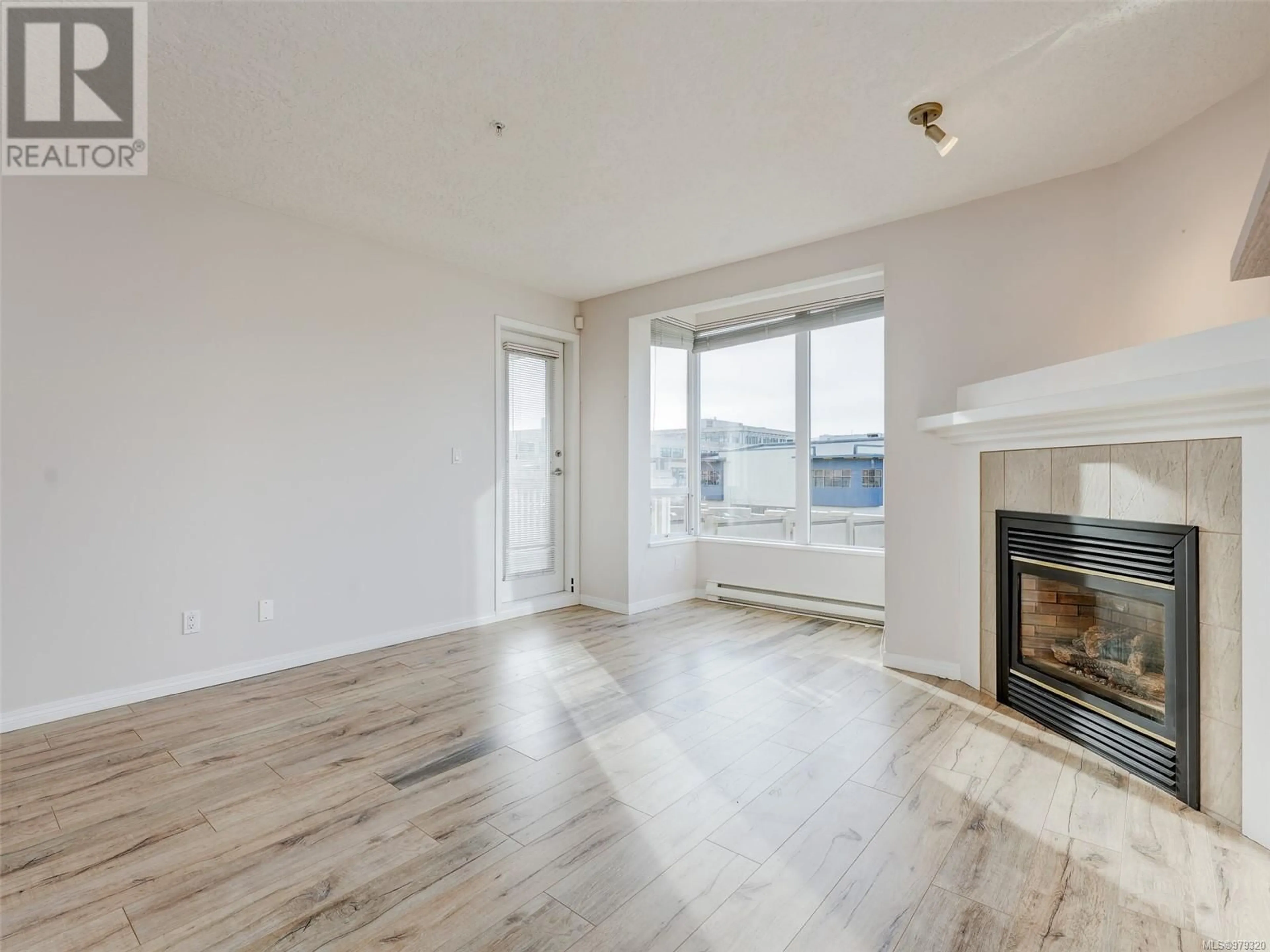 A pic of a room, wood floors for 307 380 Waterfront Cres, Victoria British Columbia V8X4M9