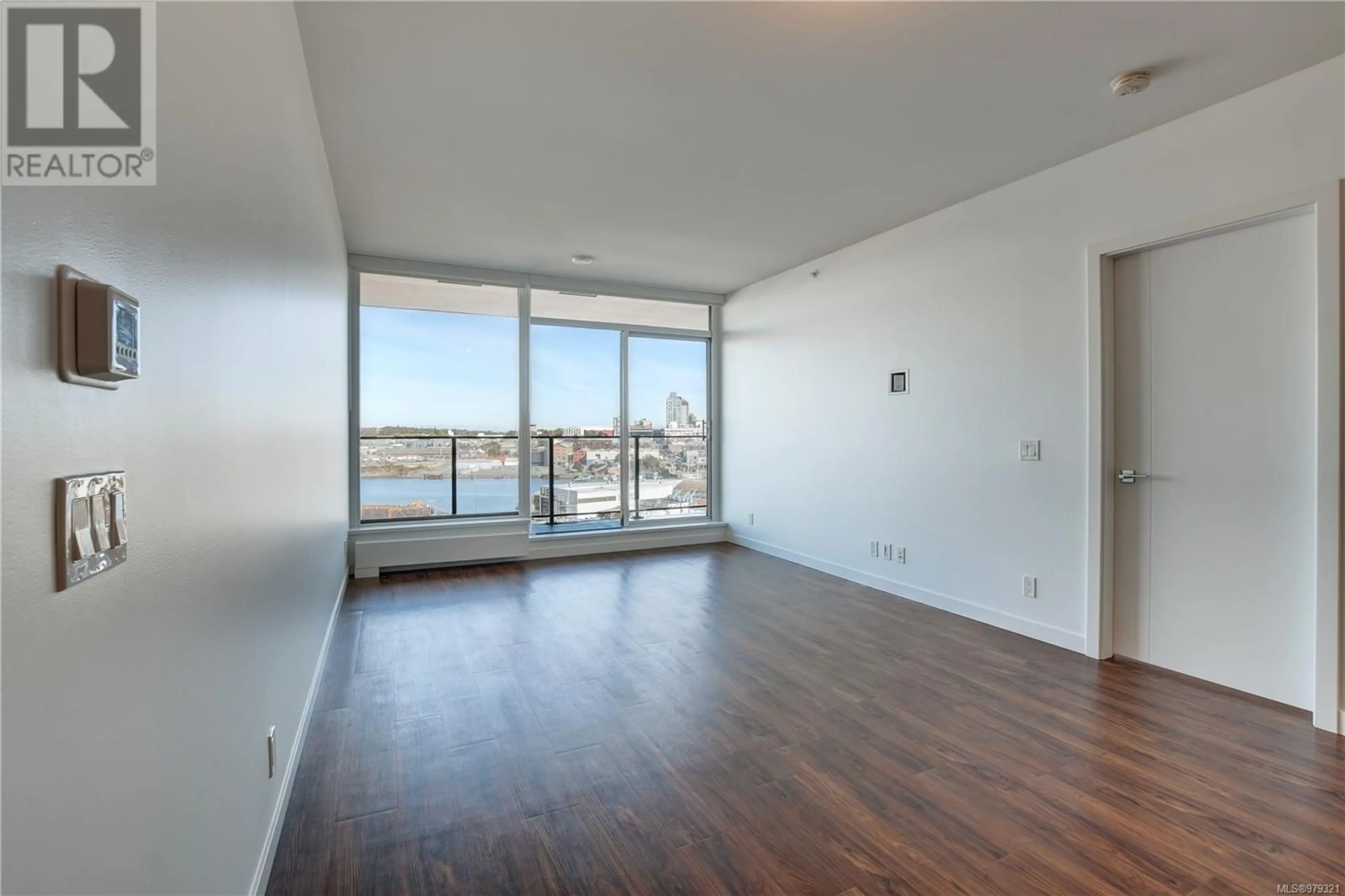 A pic of a room, wood floors for 708 363 Tyee Rd, Victoria British Columbia V9A0B5