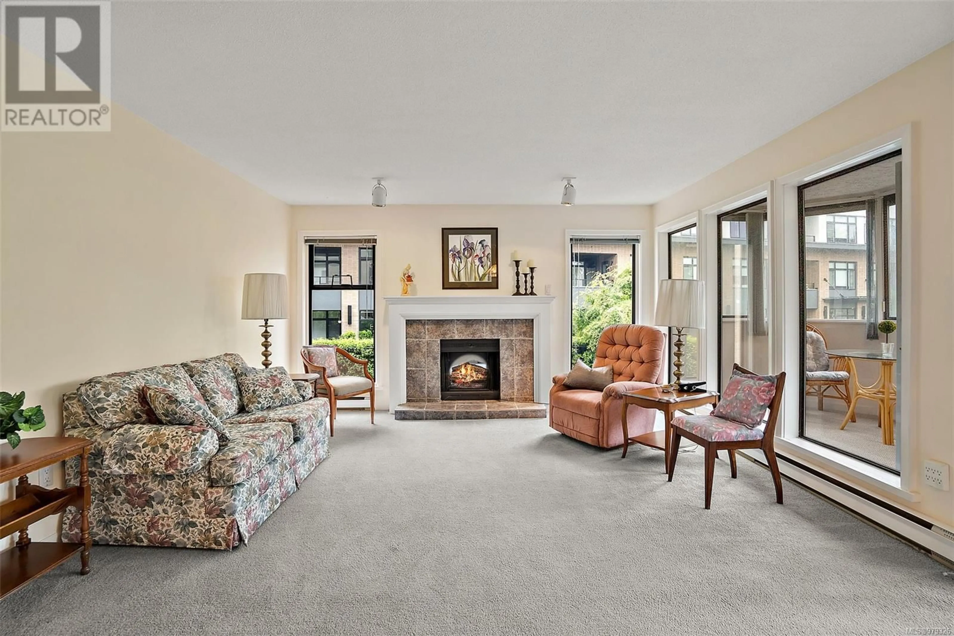 Living room, carpet floors for 203 906 Southgate St, Victoria British Columbia V8V2Y2