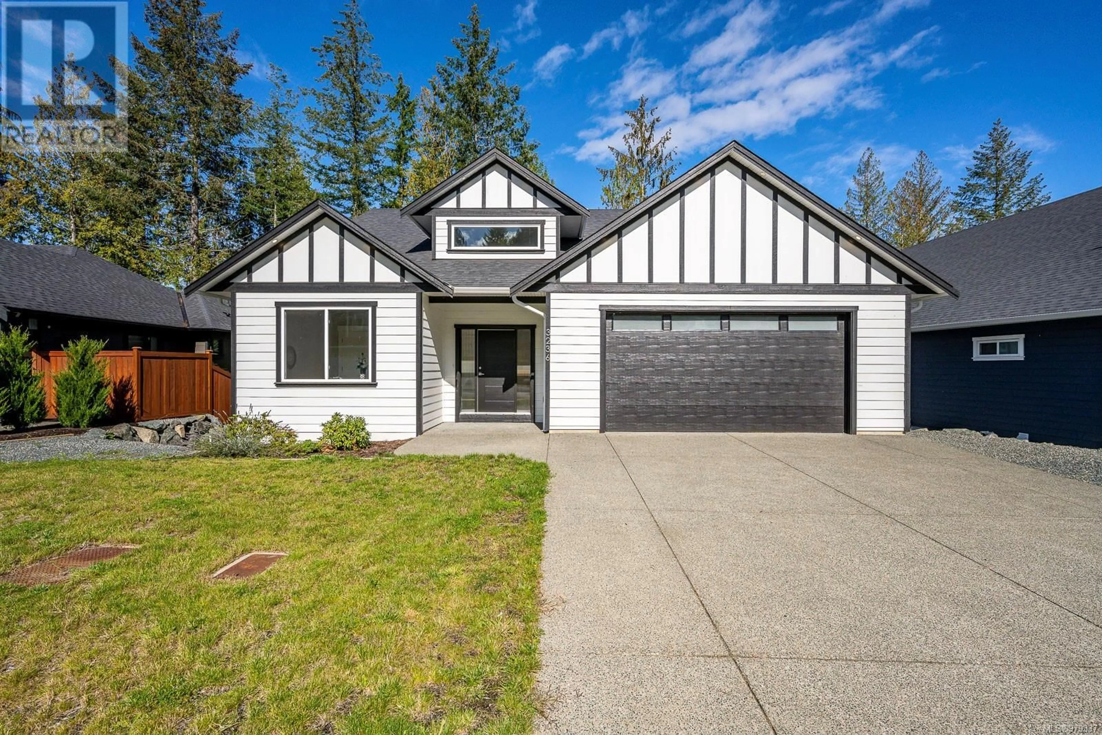 Home with vinyl exterior material for 3236 Klanawa Cres, Courtenay British Columbia V9N0H4