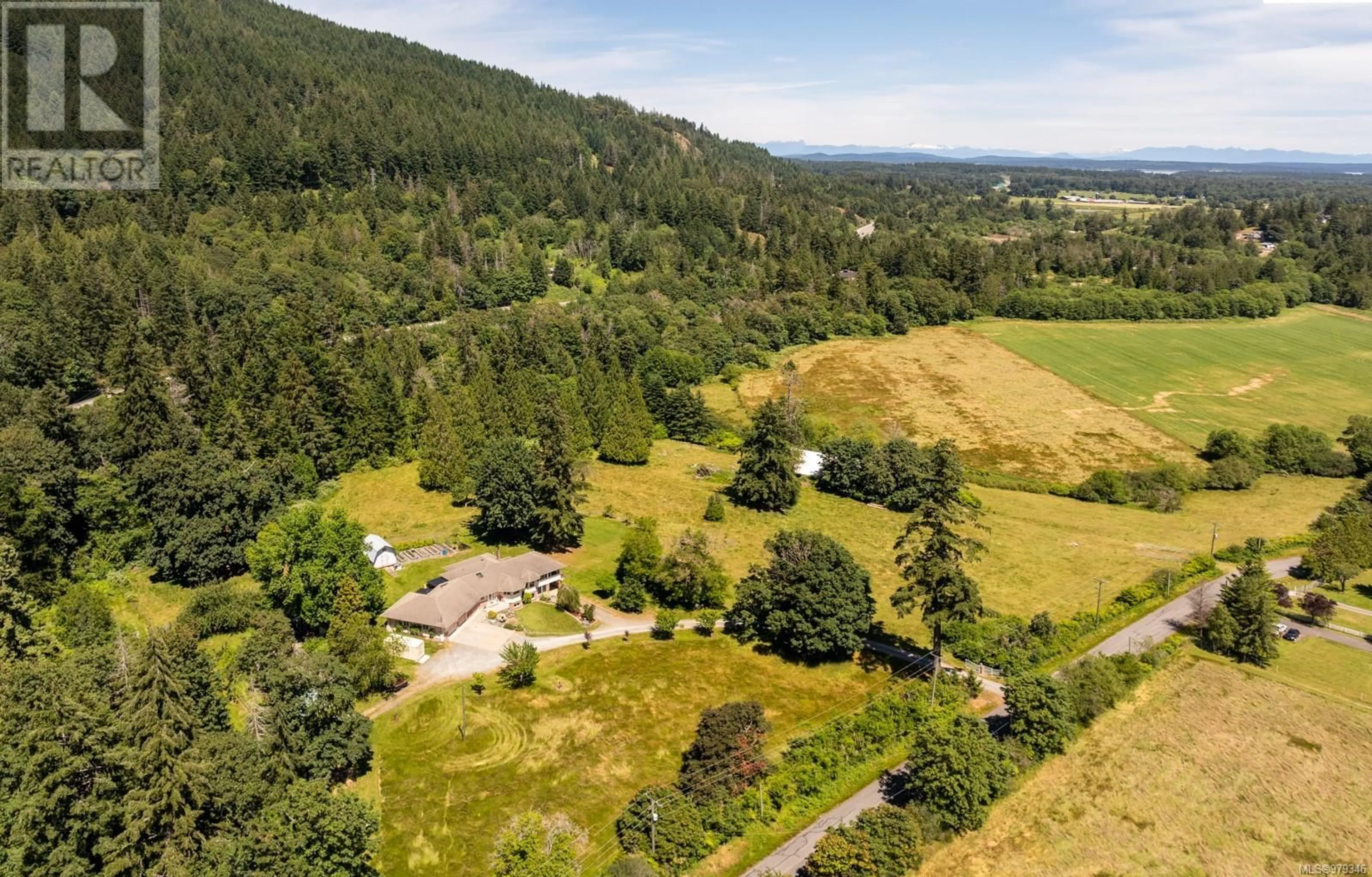 A pic from outside/outdoor area/front of a property/back of a property/a pic from drone, forest/trees view for 7028 WESTHOLME ROAD, Westholme British Columbia V9L6B4
