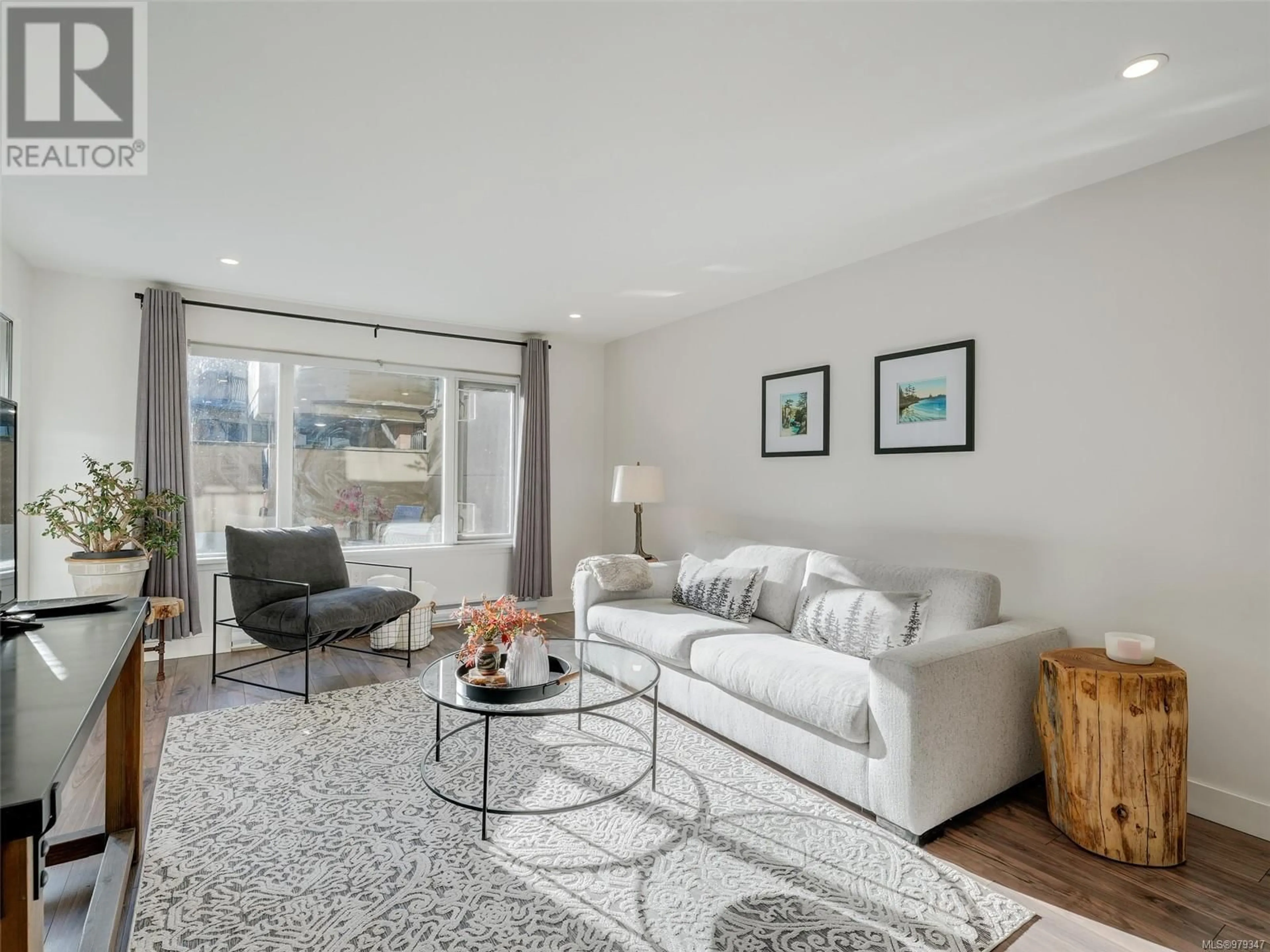 Living room, wood floors for 102 103 Gorge Rd E, Victoria British Columbia V9A6Z2