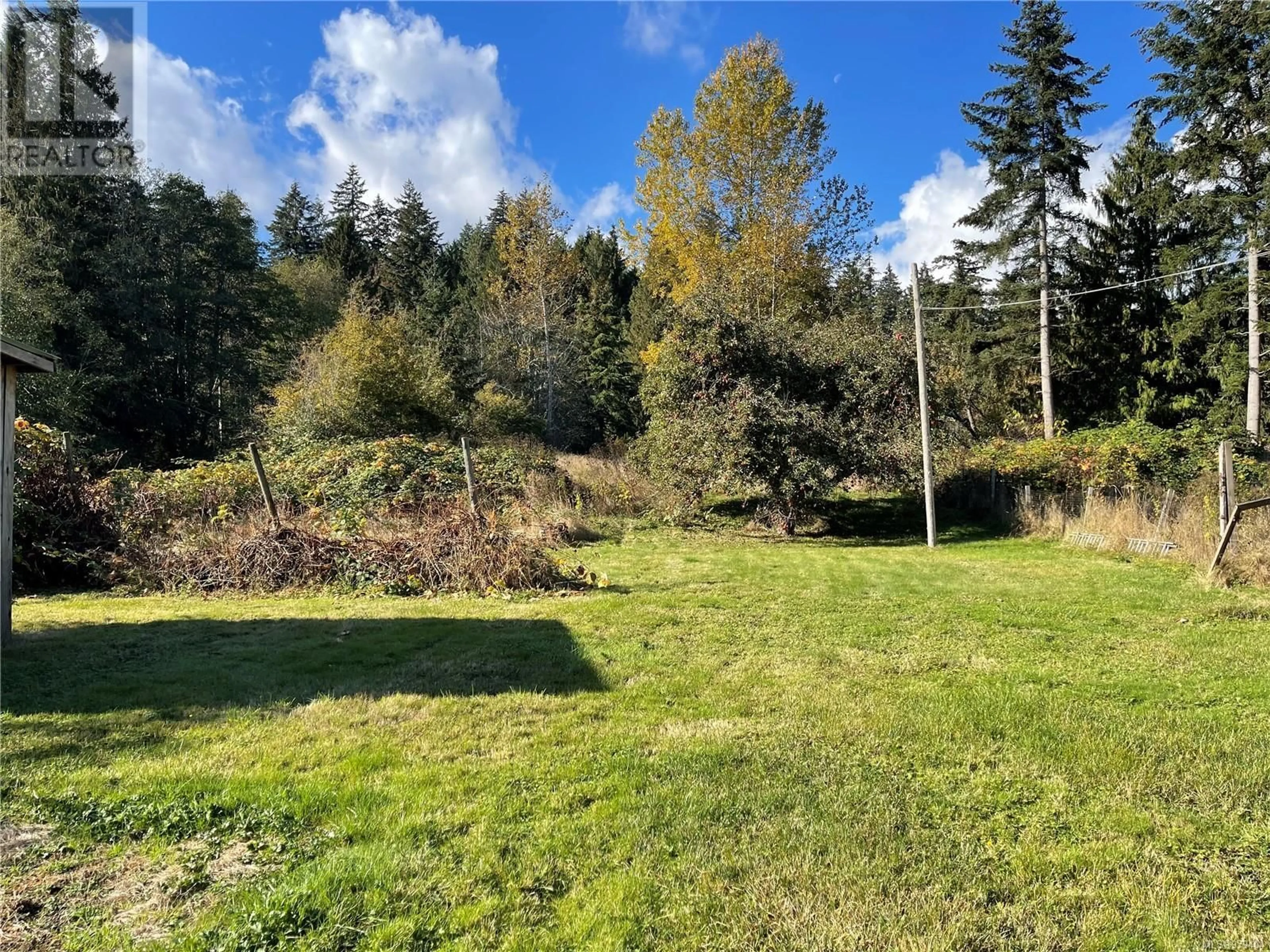 Patio, the fenced backyard for 1329 Wexford Rd, Nanaimo British Columbia V9R6O6