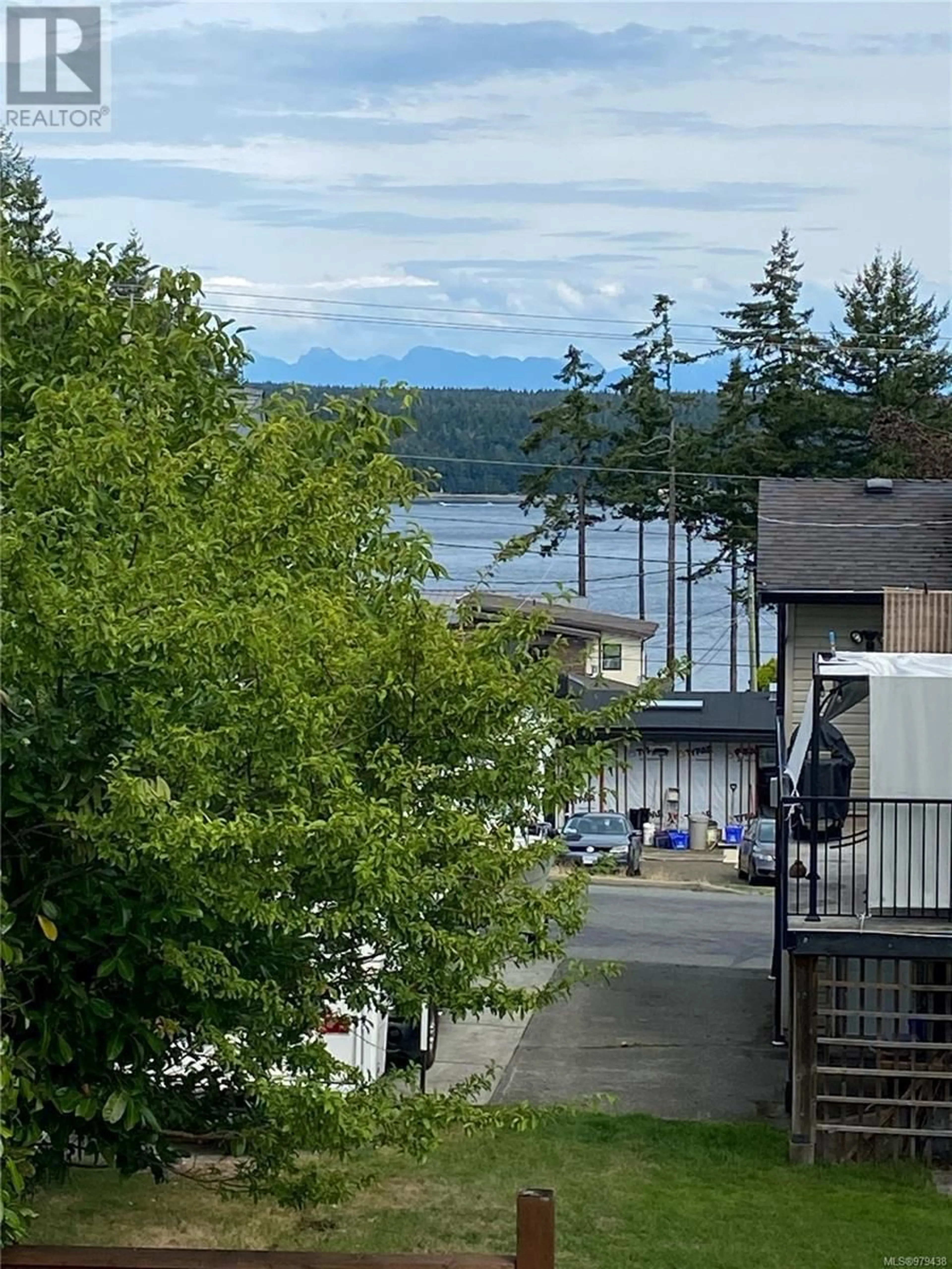 A pic from outside/outdoor area/front of a property/back of a property/a pic from drone, water/lake/river/ocean view for 875 Alder St S, Campbell River British Columbia V9W1Z4