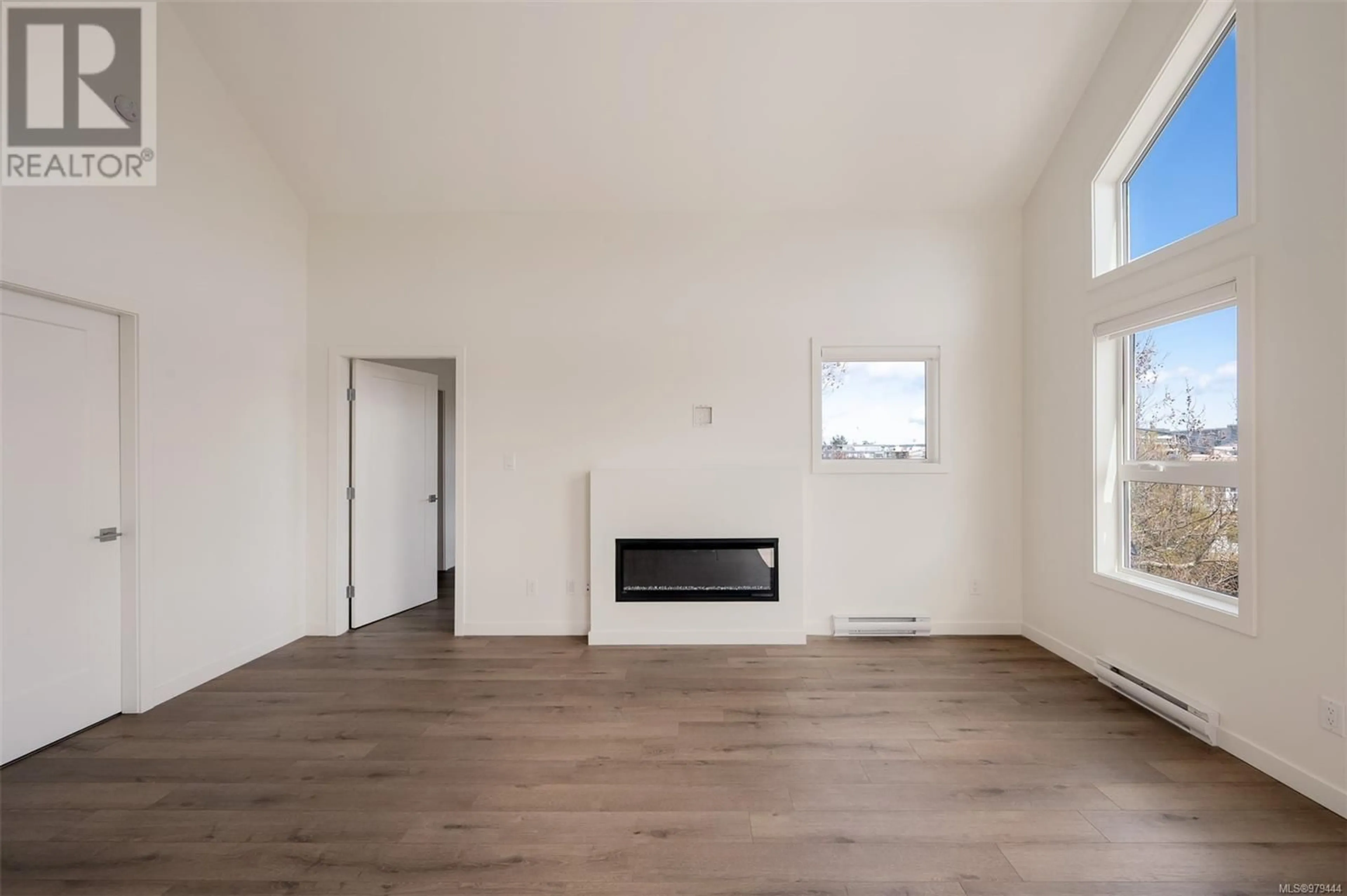 A pic of a room, wood floors for 401 9716 Third St, Sidney British Columbia V8L3A2