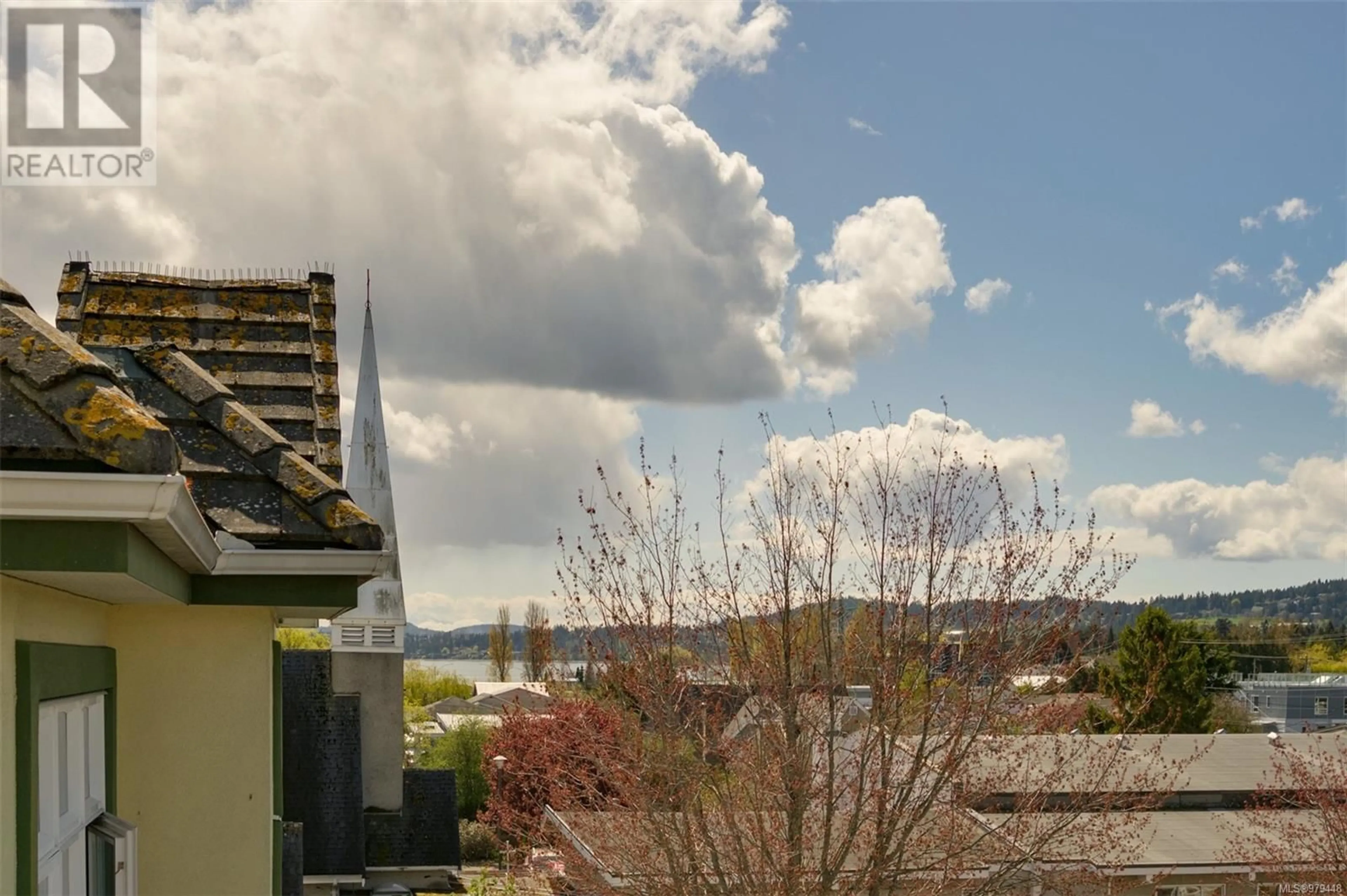 A pic from exterior of the house or condo, the street view for 303 9716 Third St, Sidney British Columbia V8L3A2