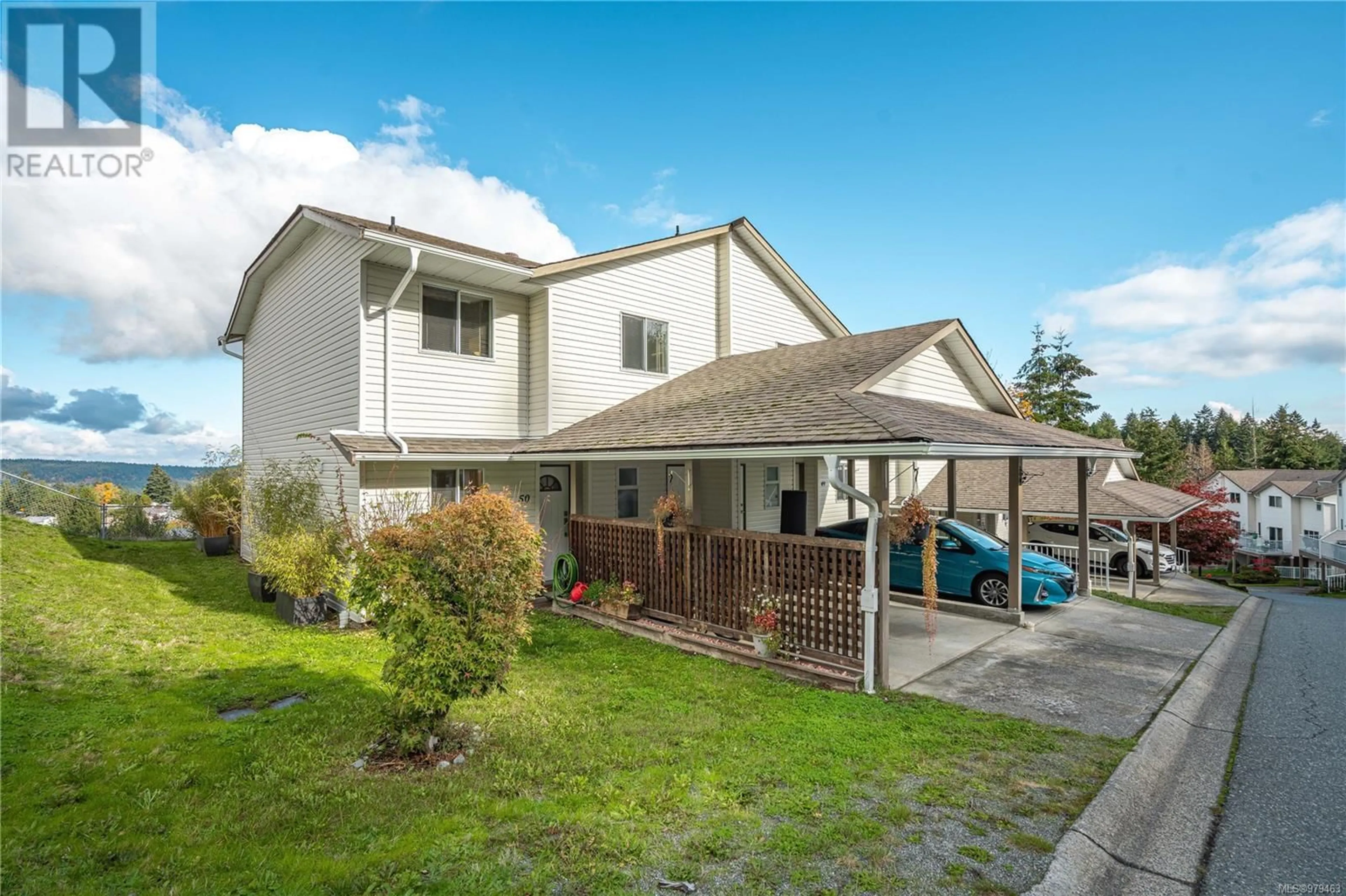 Frontside or backside of a home, the fenced backyard for 50 941 Malone Rd, Ladysmith British Columbia V9G1S3