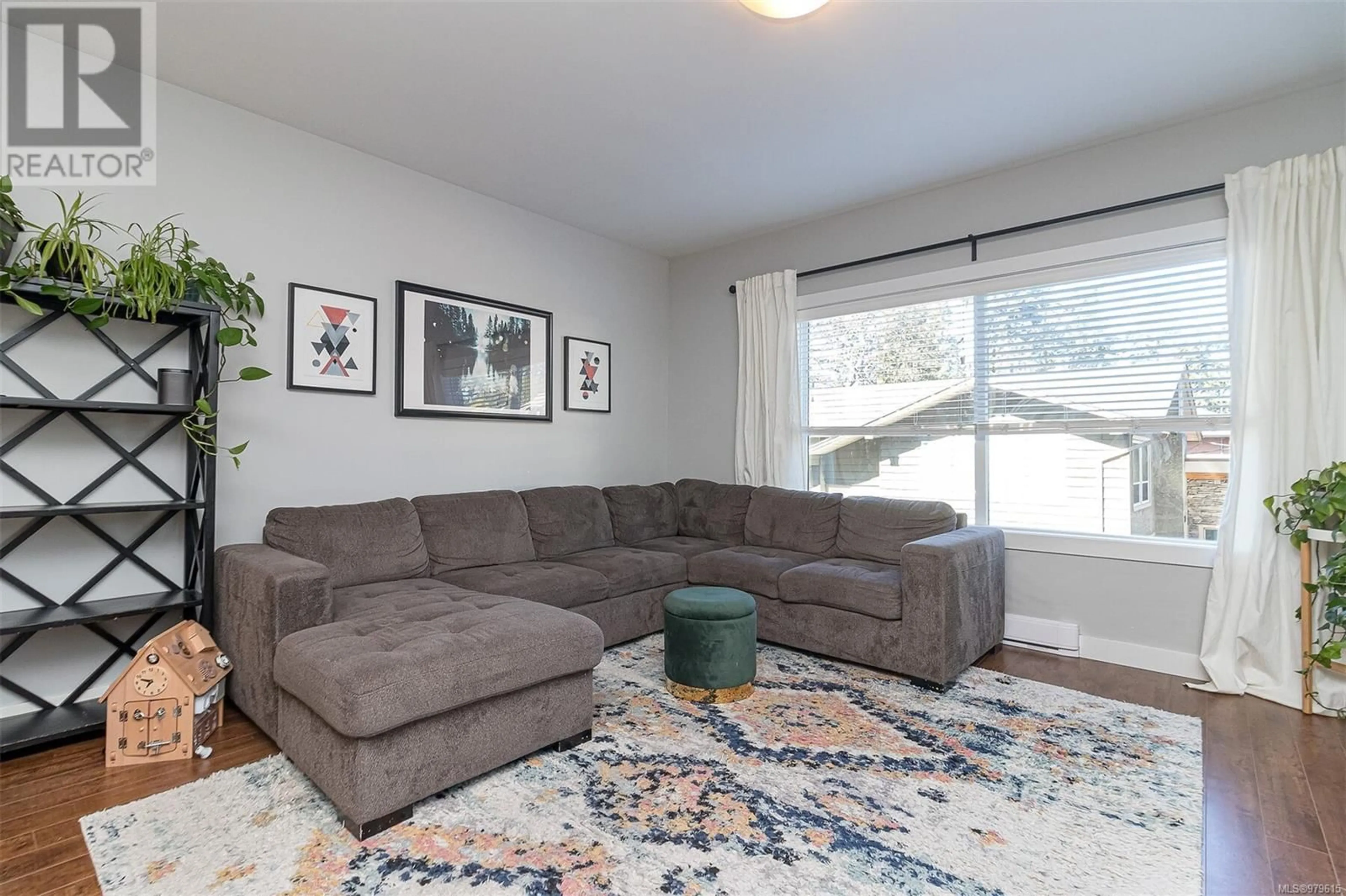 Living room, carpet floors for 202 703 Massie Dr, Langford British Columbia V9B3A9