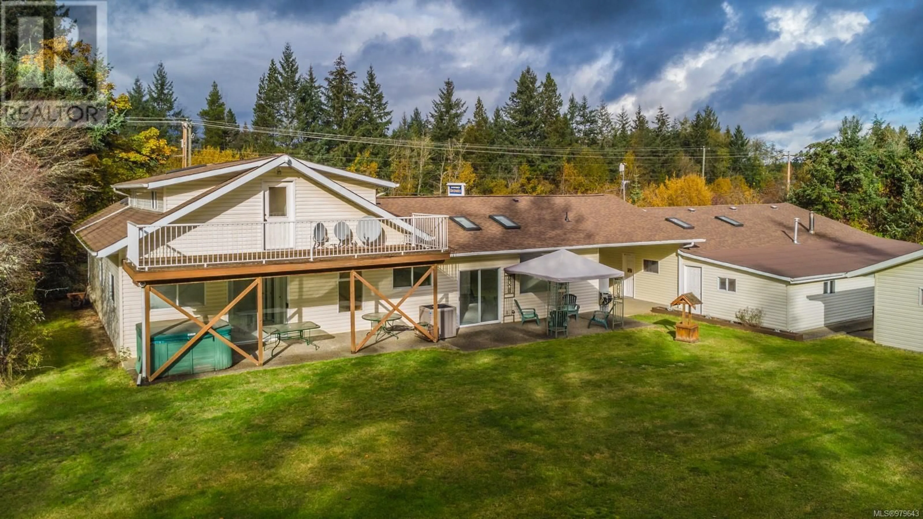 Frontside or backside of a home, the fenced backyard for 2196 Alberni Hwy, Coombs British Columbia V0R1M0