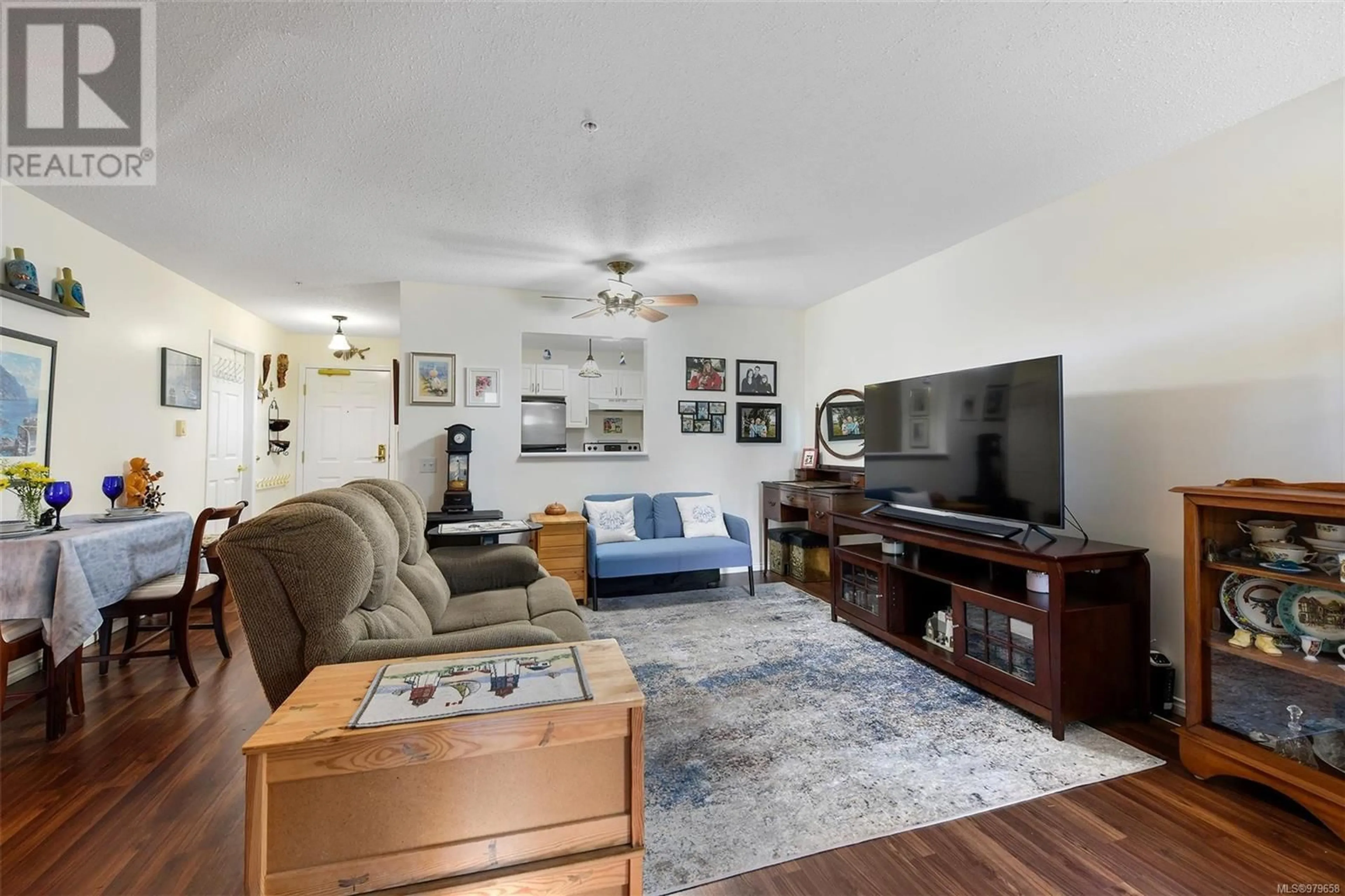 Living room, wood floors for 209 290 Island Hwy, View Royal British Columbia V9B1G5