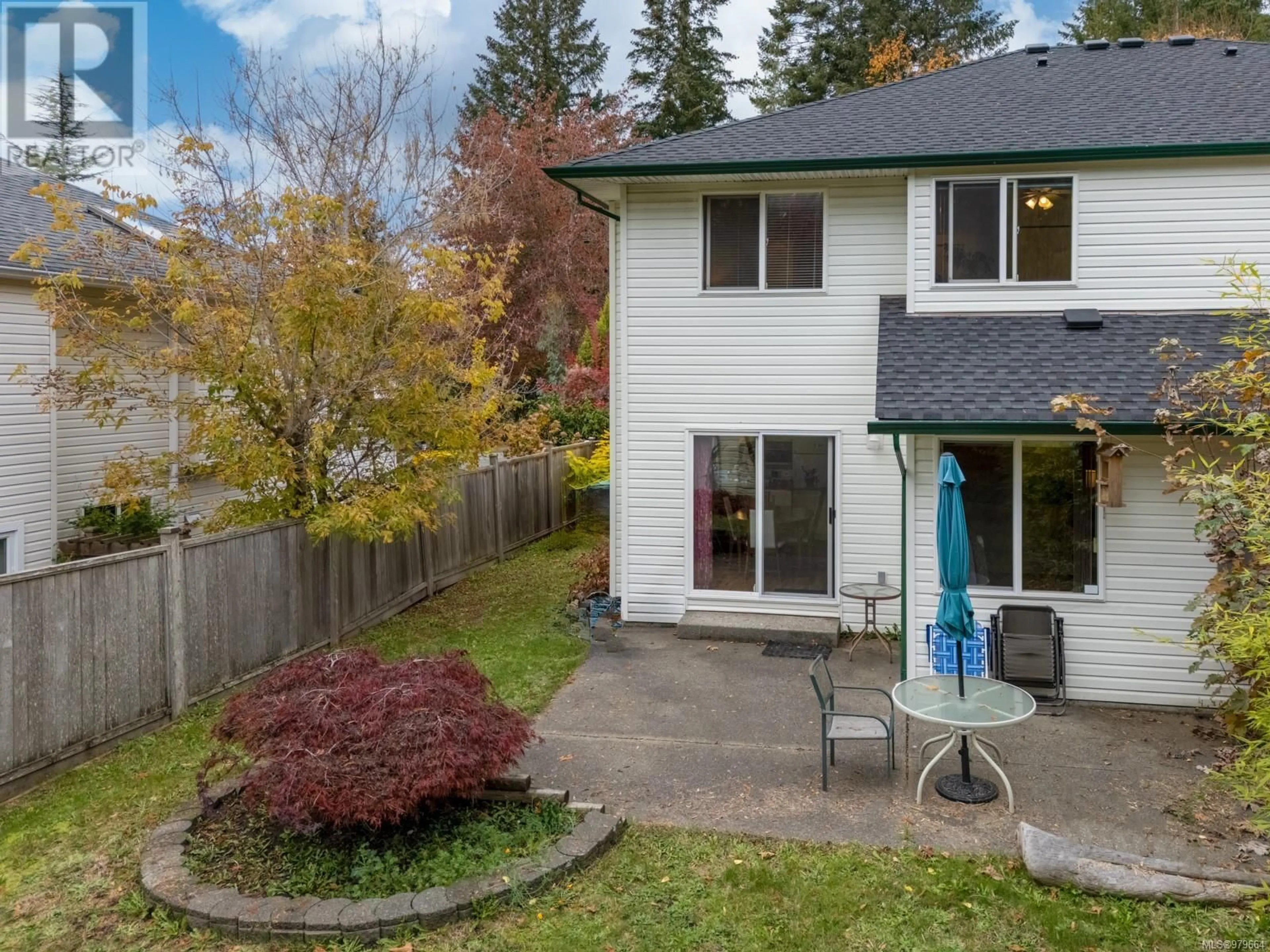 Frontside or backside of a home, the fenced backyard for B 2191 Mission Rd, Courtenay British Columbia V9N8Y7