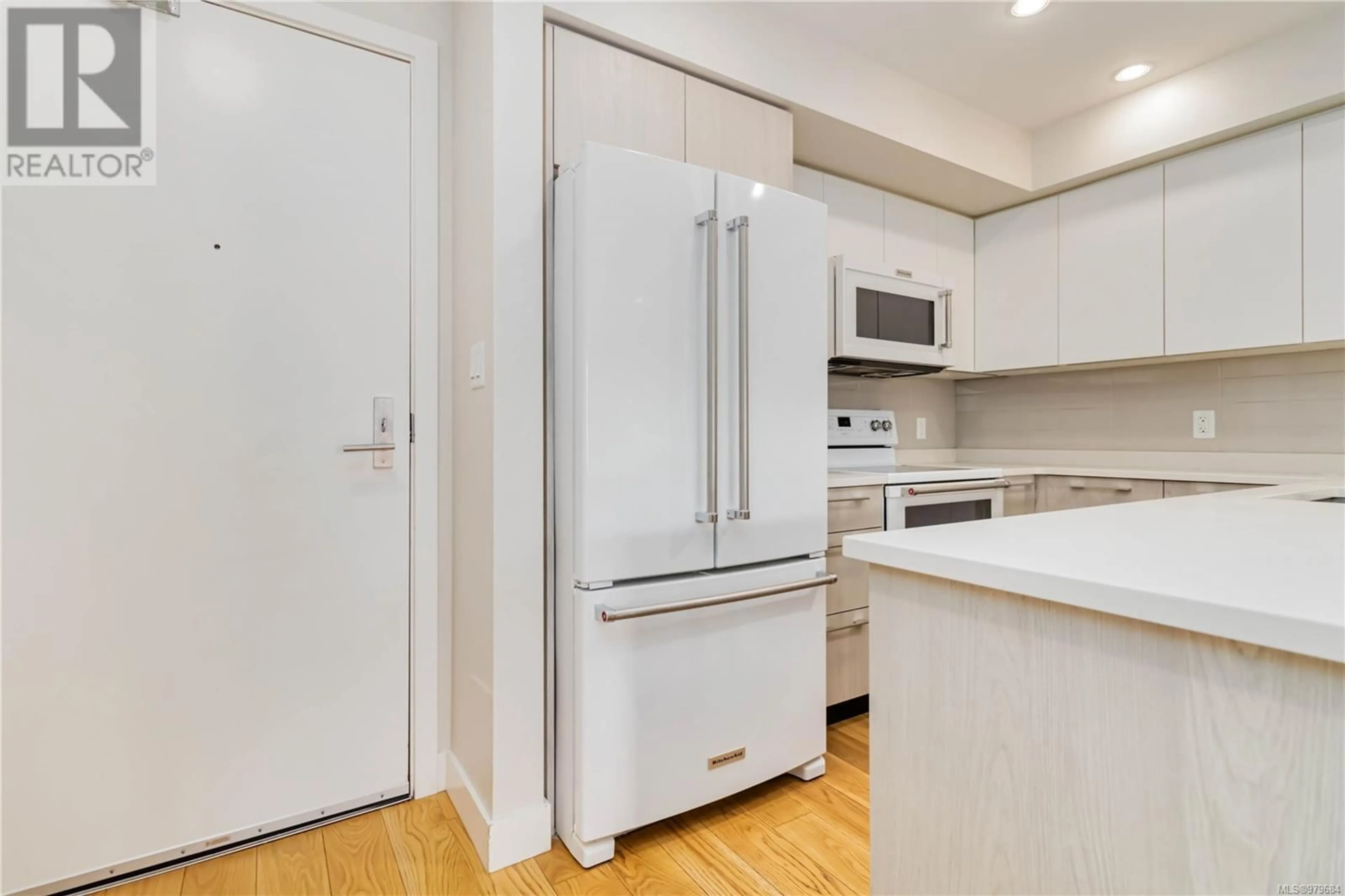 Standard kitchen, wood floors for 208 1000 Inverness Rd, Saanich British Columbia V8X2S1