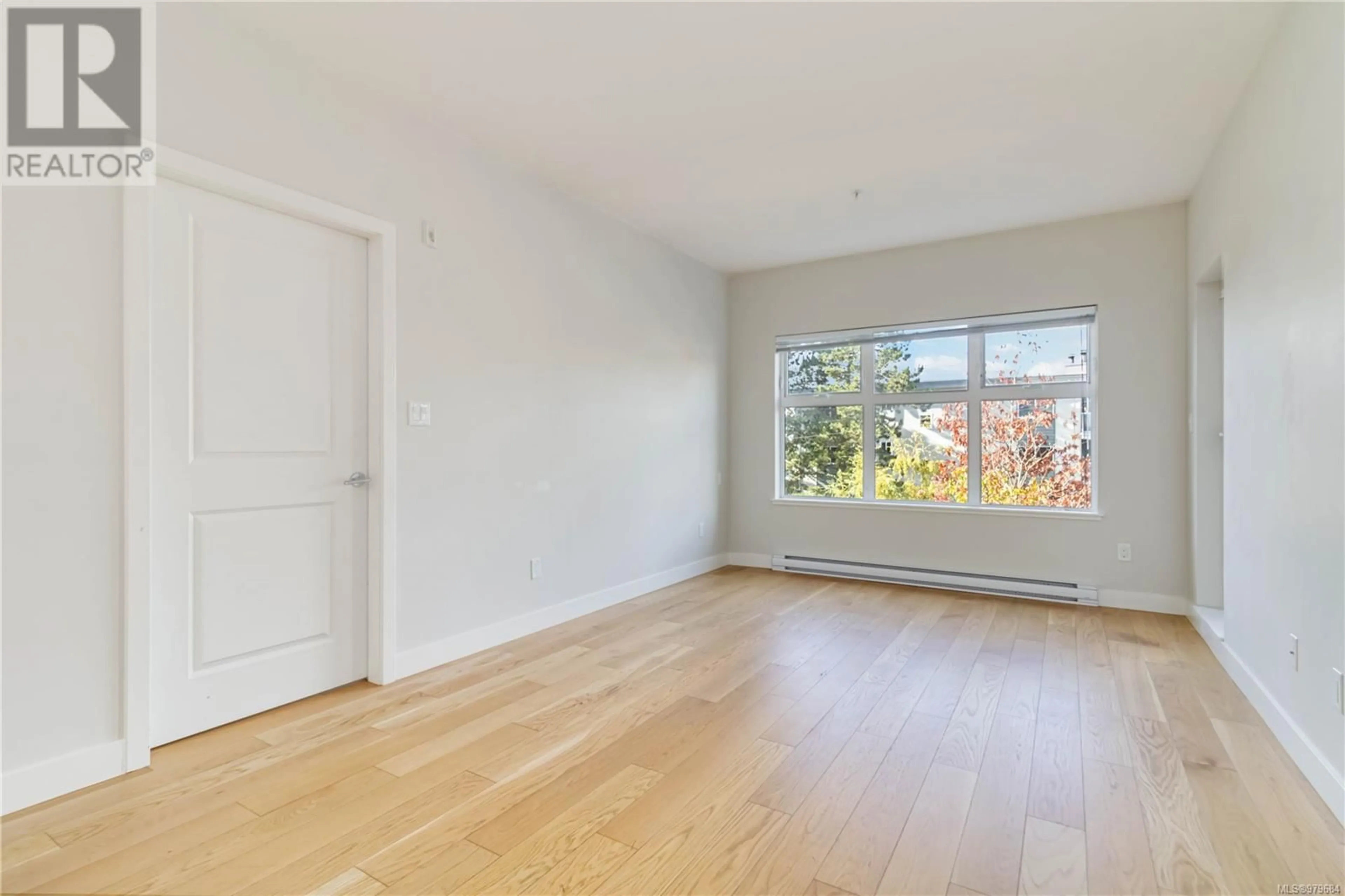 A pic of a room, wood floors for 208 1000 Inverness Rd, Saanich British Columbia V8X2S1